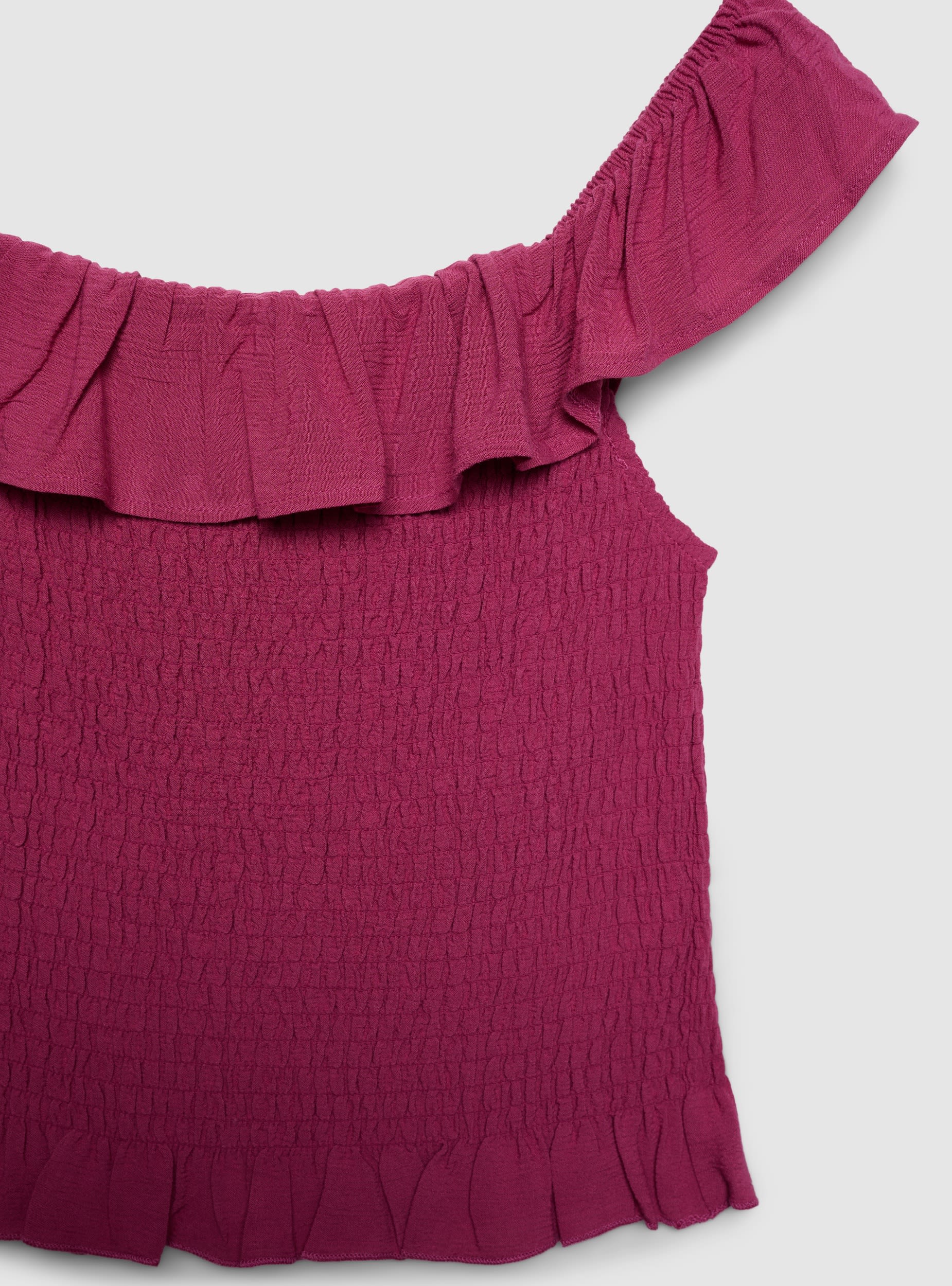 Blusa a spalle scoperte con balza