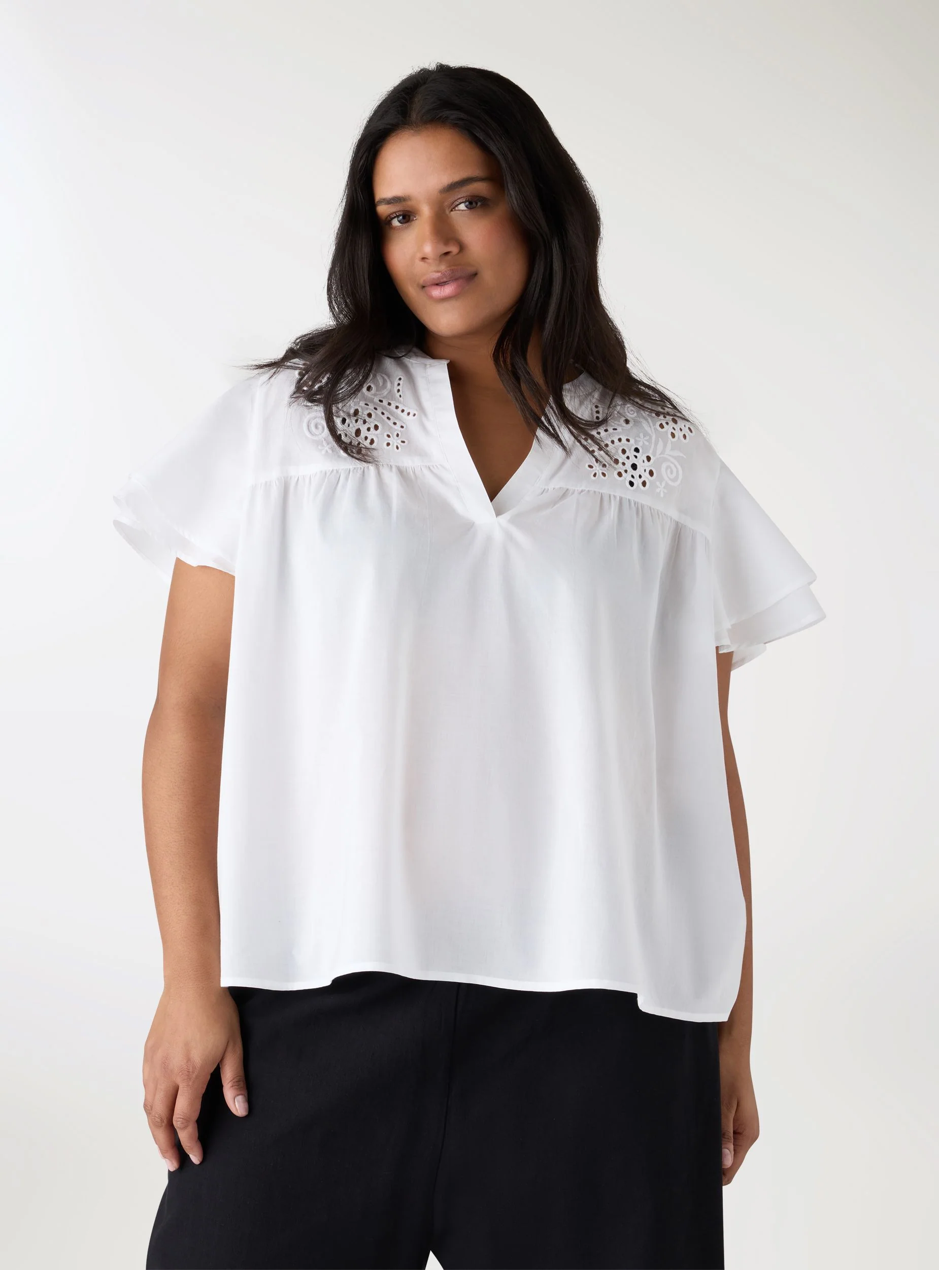 Blusa con ricami floreali e scollo a V - Image 2