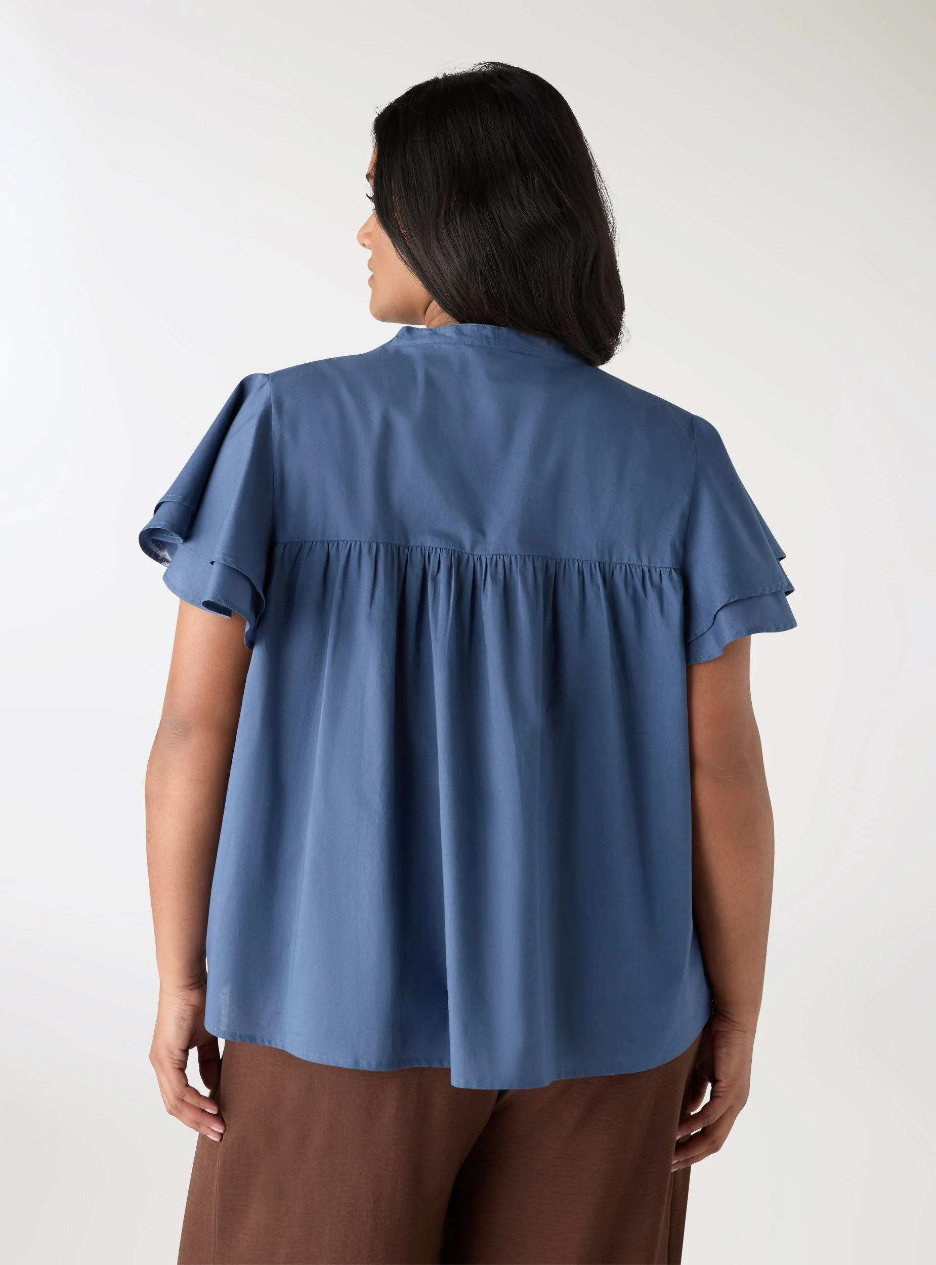 Blusa con ricami floreali e scollo a V - Image 3