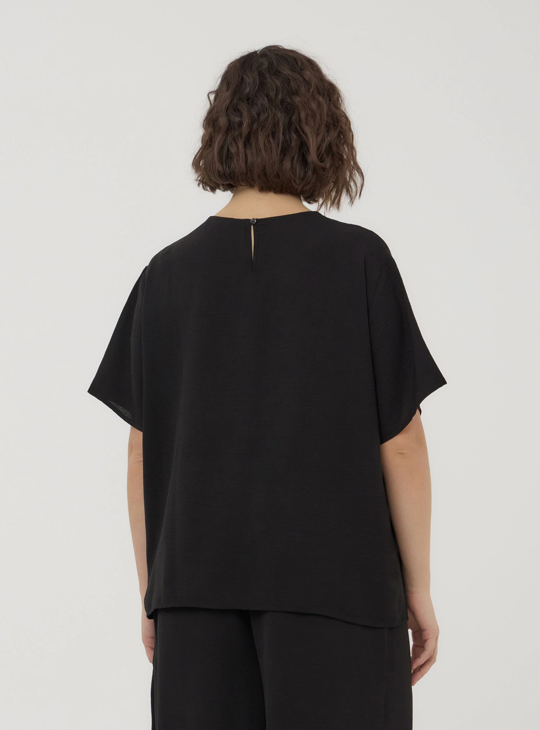 Blusa maniche corte tinta unita - Image 2