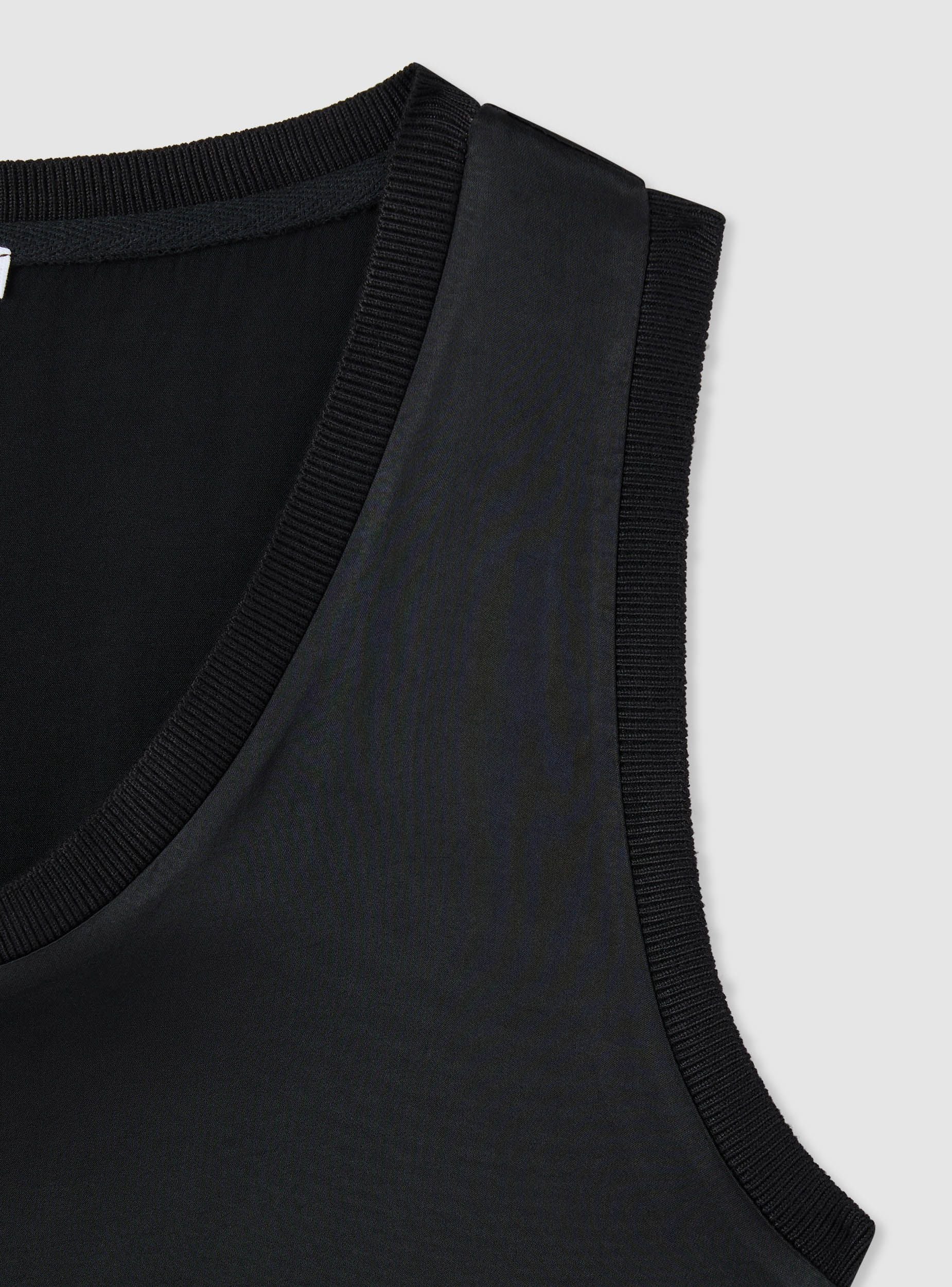 Blusa serafino smanicata a tinta unita - Image 6
