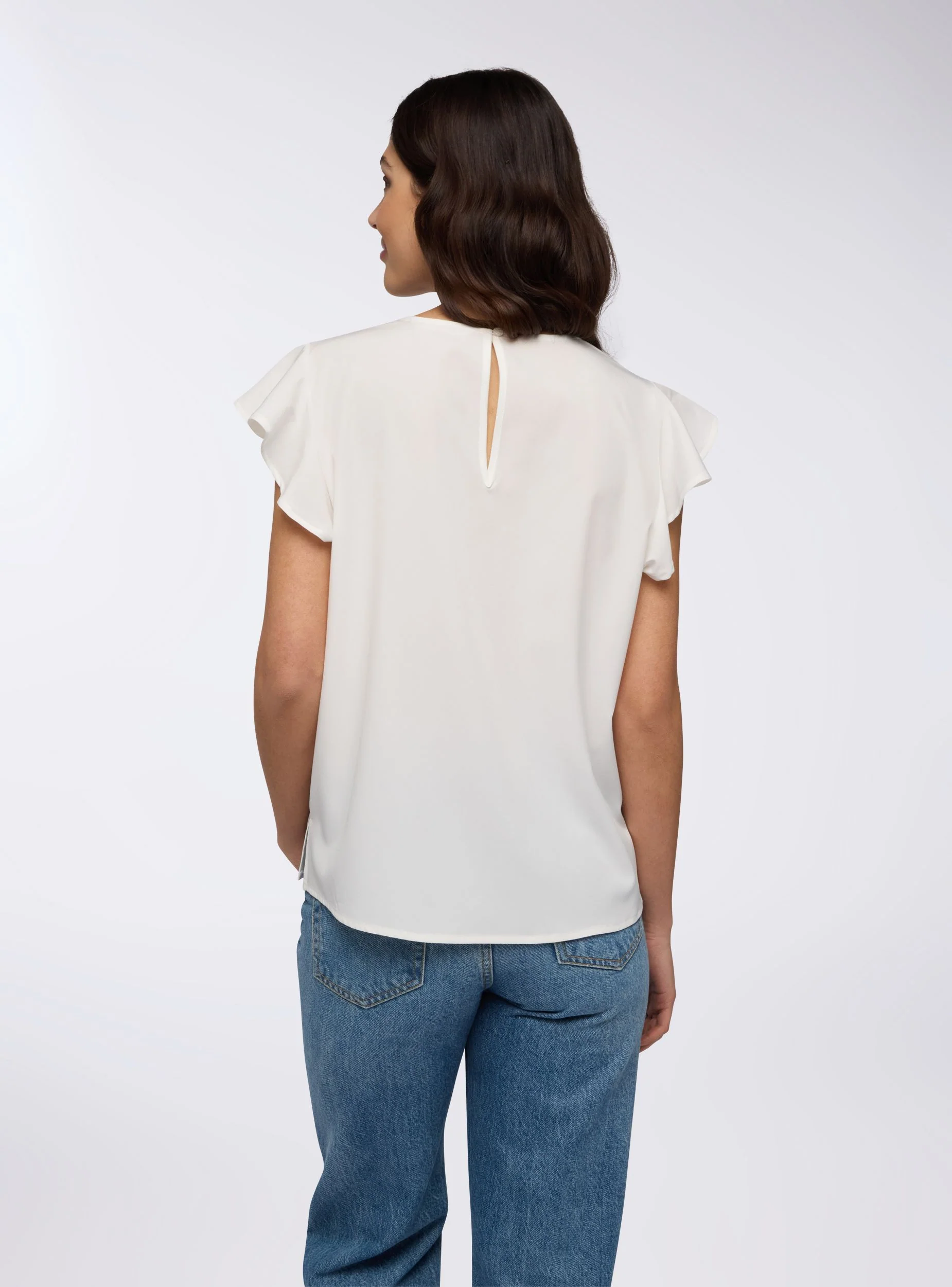 Blusa tinta unita a maniche corte - Image 3