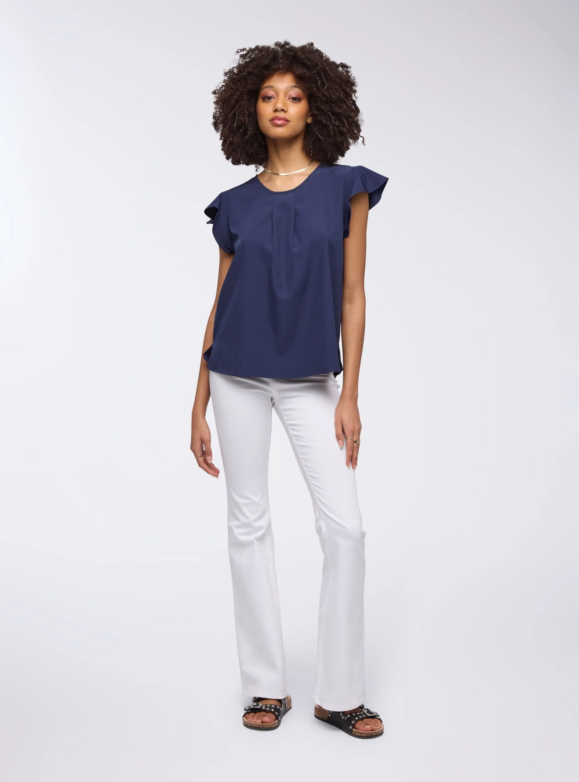 Blusa tinta unita a maniche corte