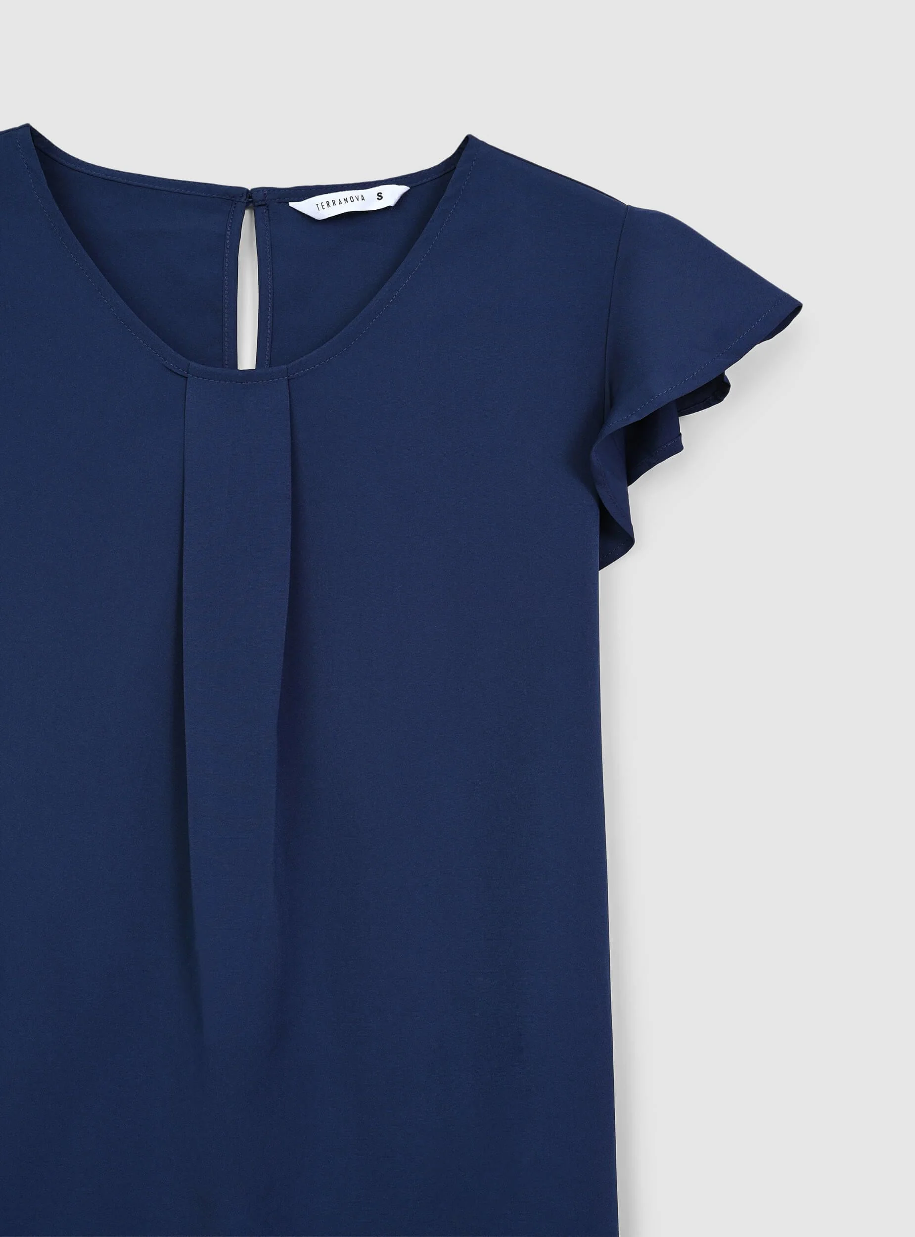 Blusa tinta unita a maniche corte - Image 6