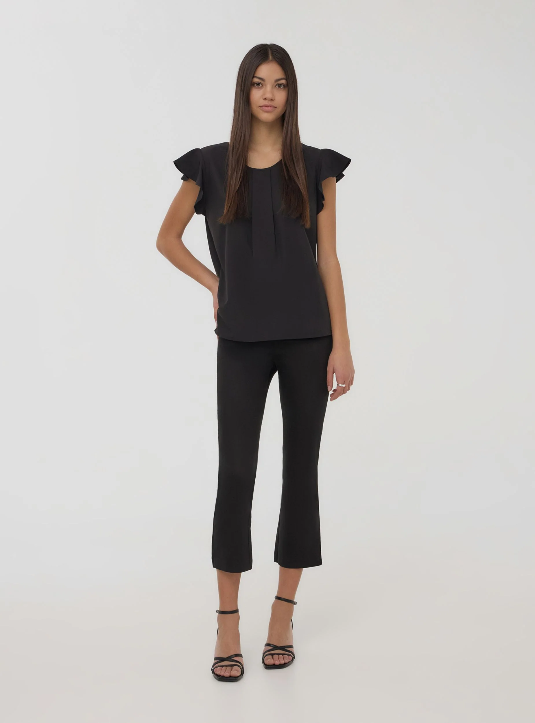 Blusa tinta unita a maniche corte