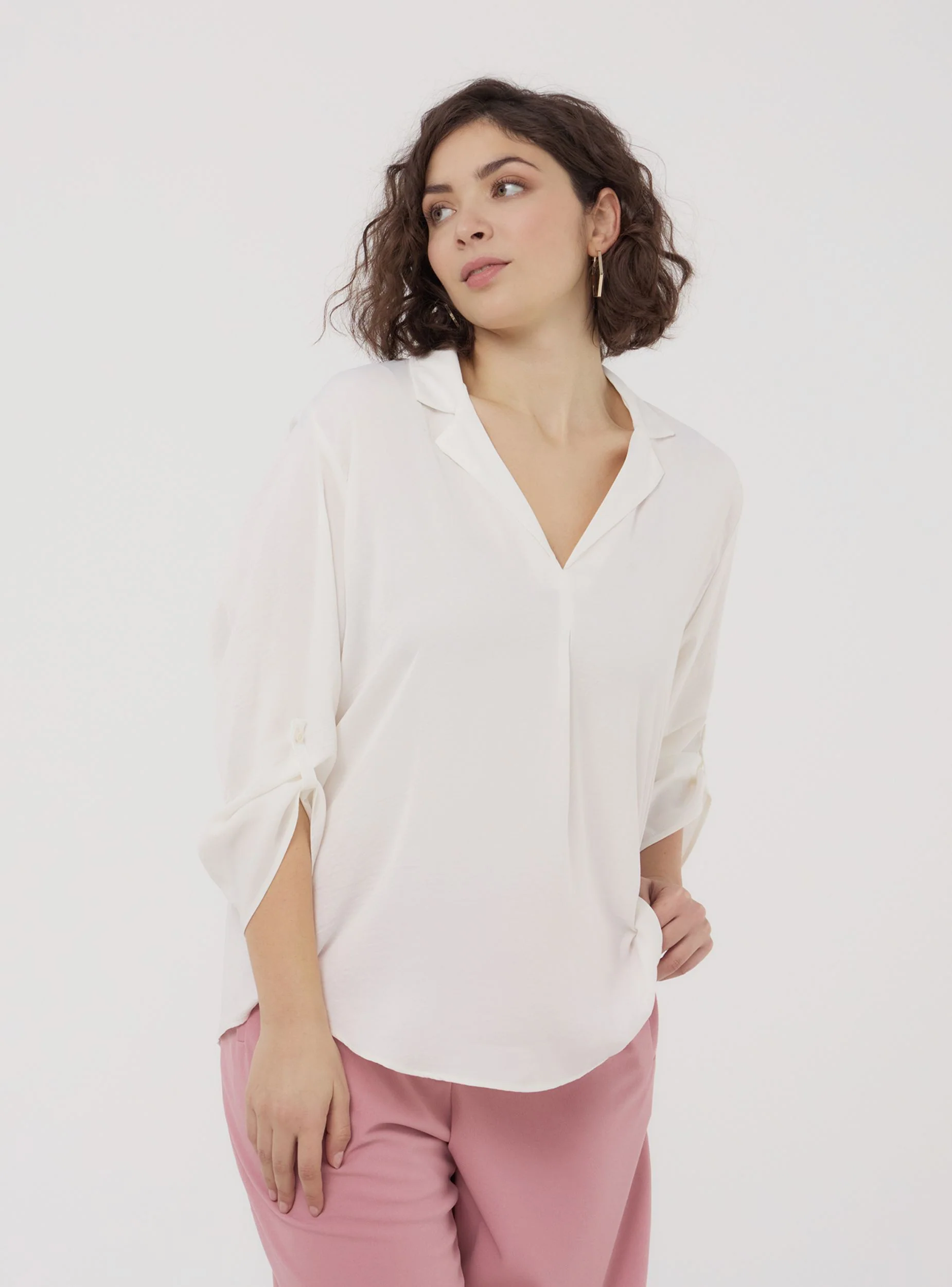 Blusa tinta unita con scollo a v
