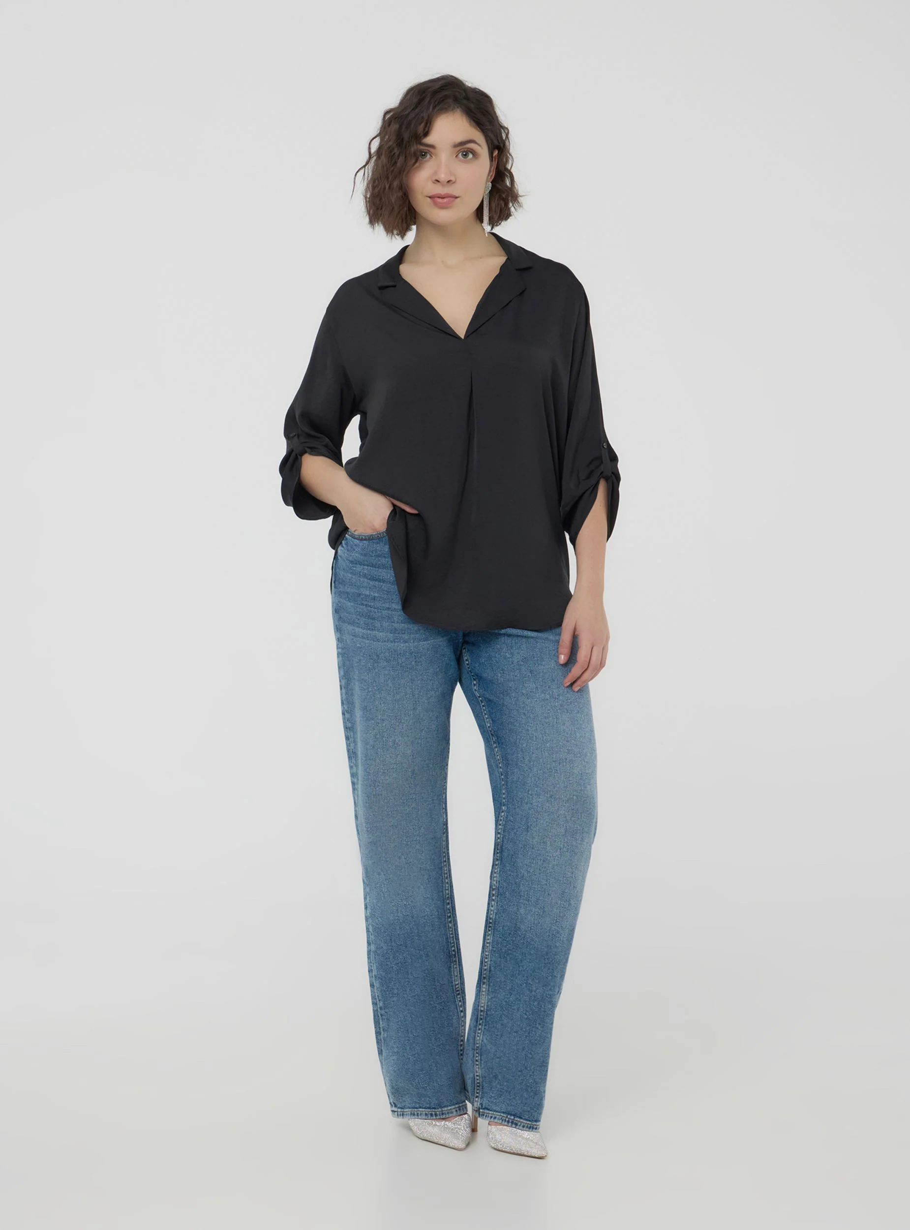 Blusa tinta unita con scollo a v