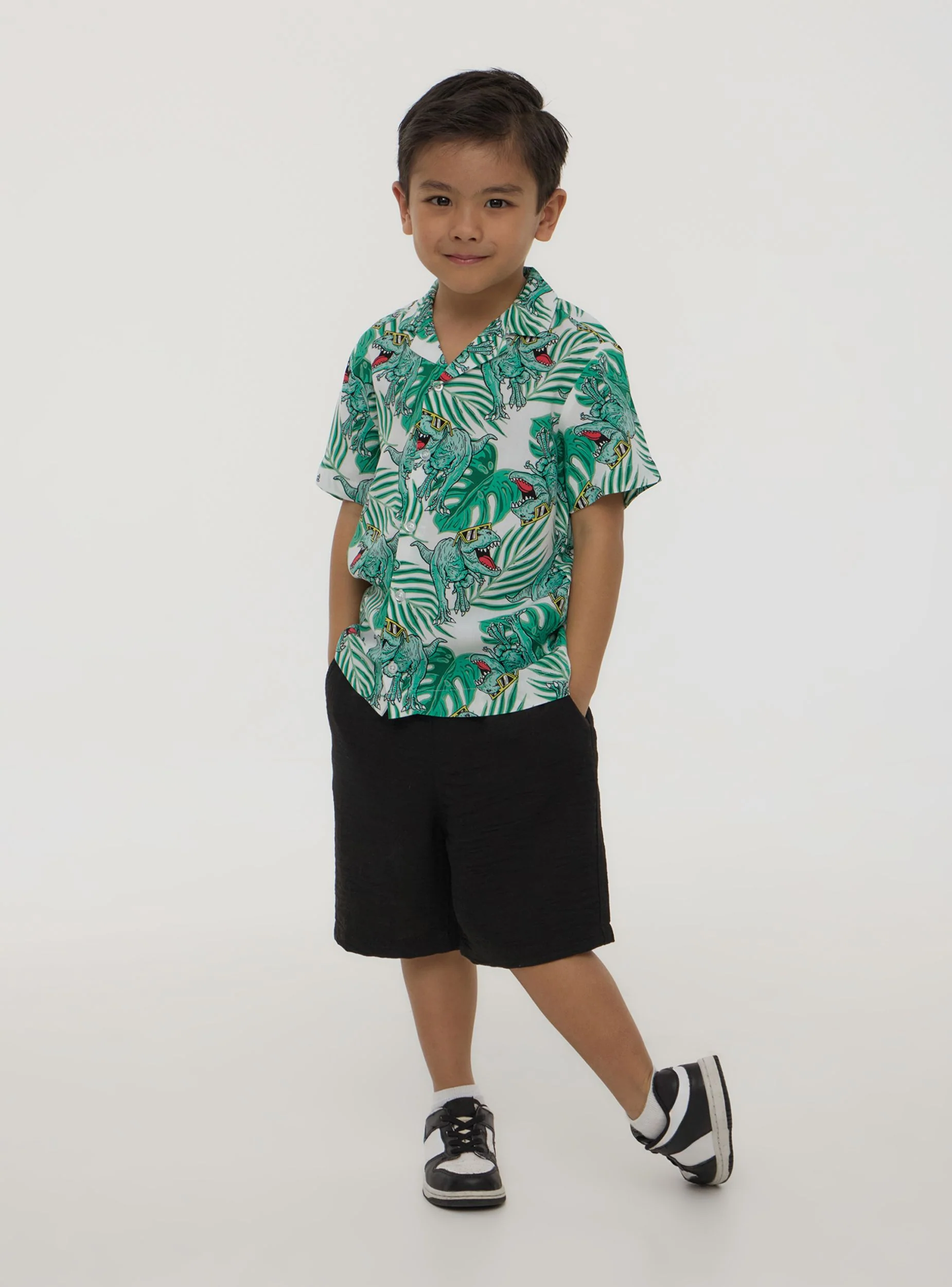 Camicia con stampa dinosauri e foglie