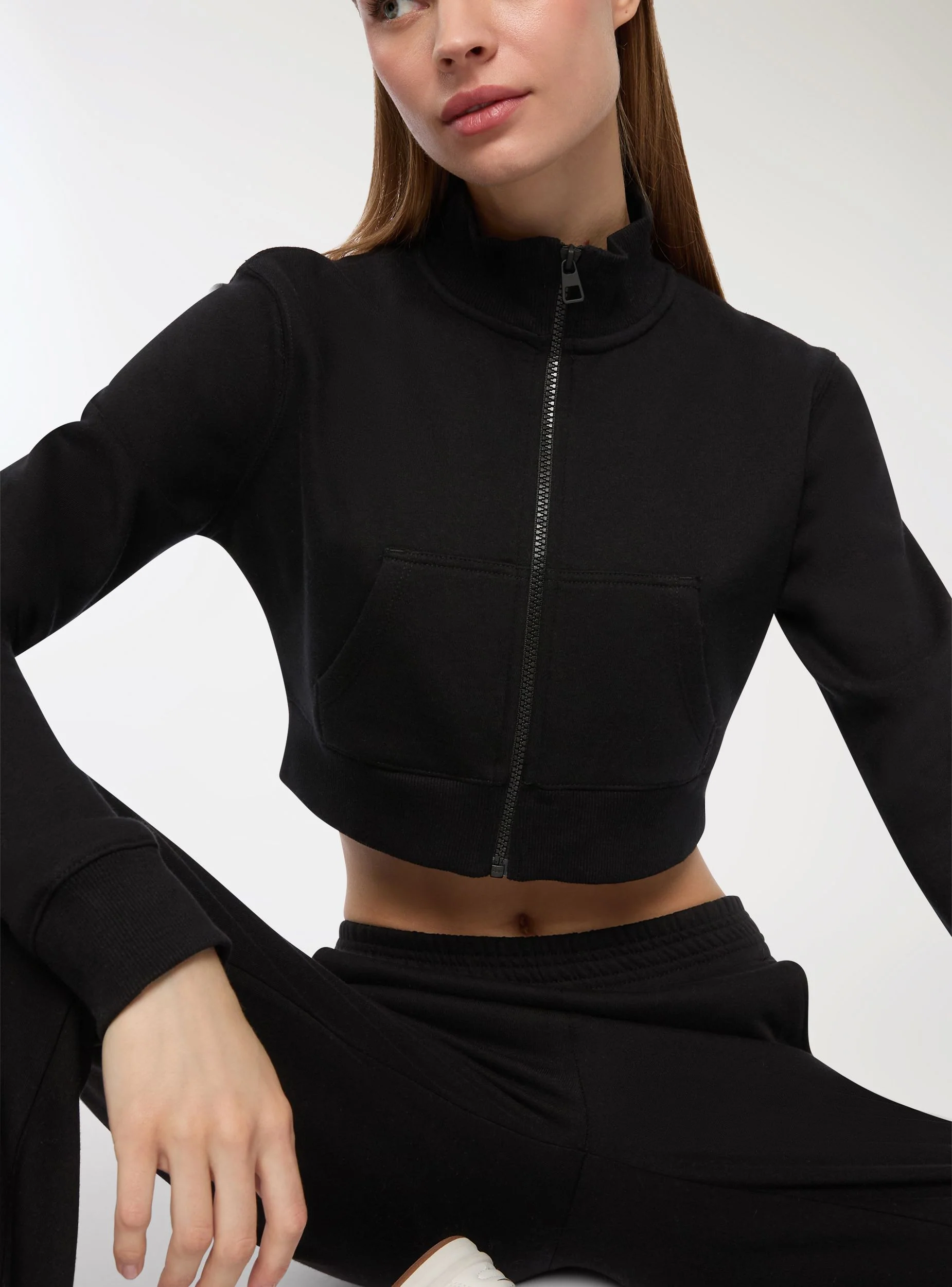 Felpa crop con zip girocollo