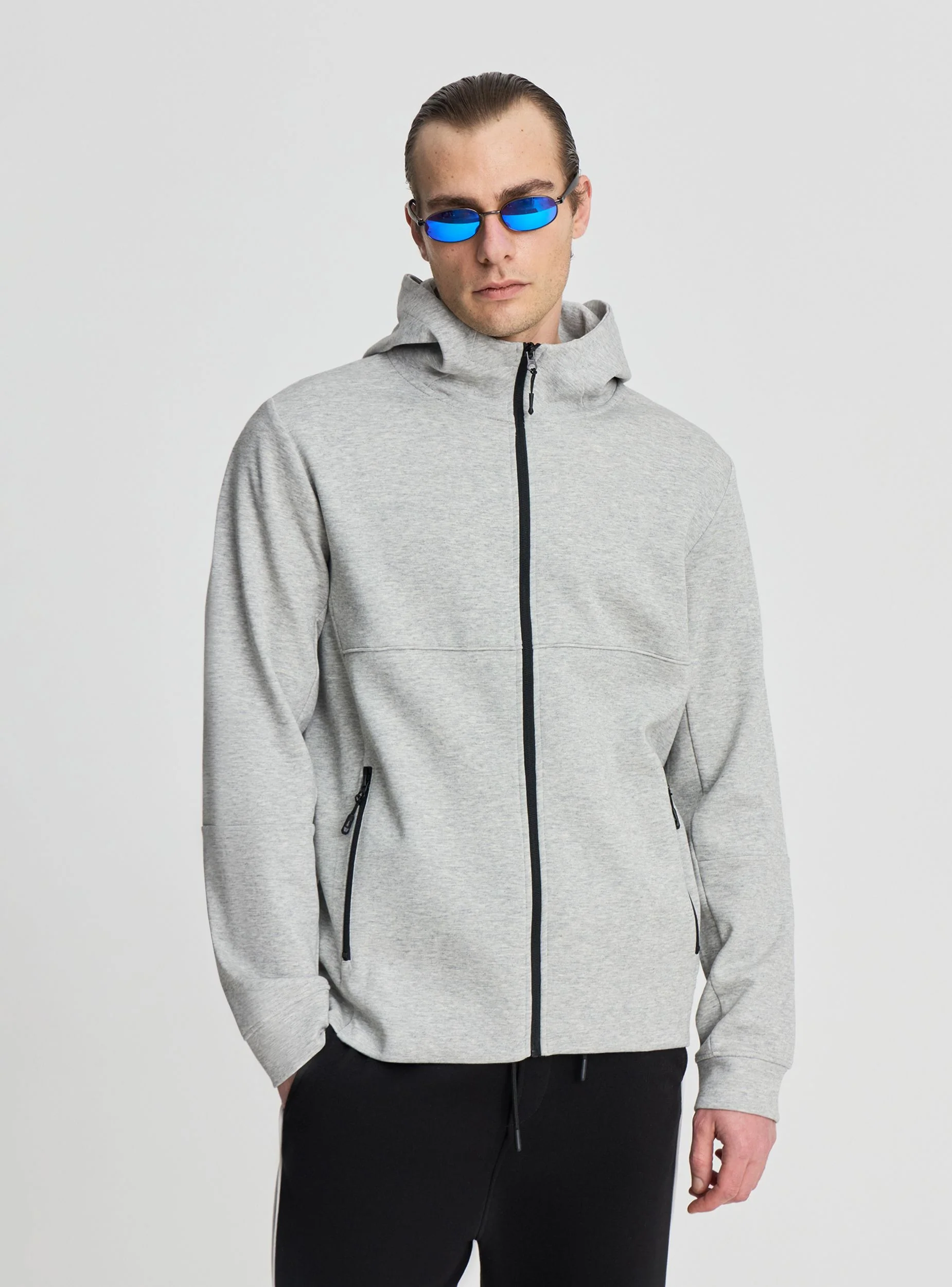 Felpa tecnica con cappuccio e zip