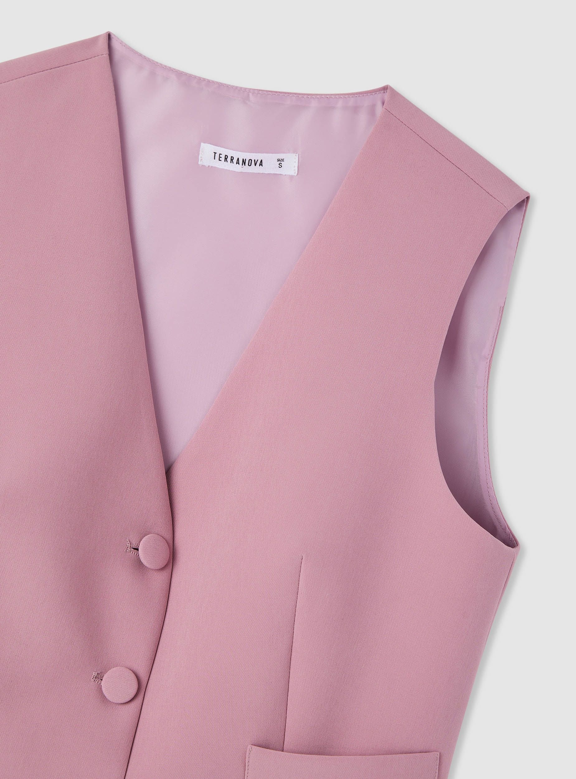 Gilet tinta unita con bottoni