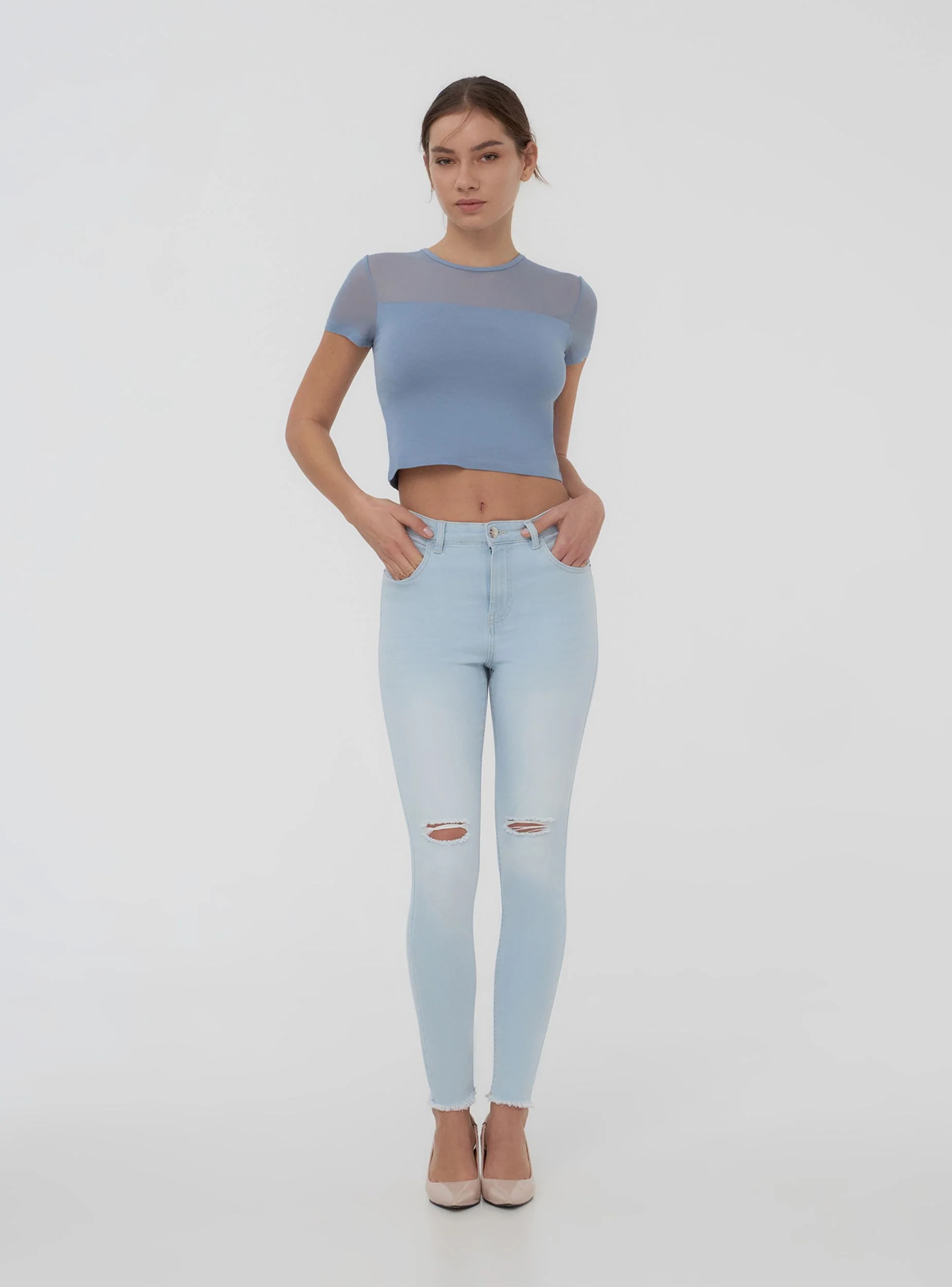 Jeans chiari skinny con strappi - Image 2