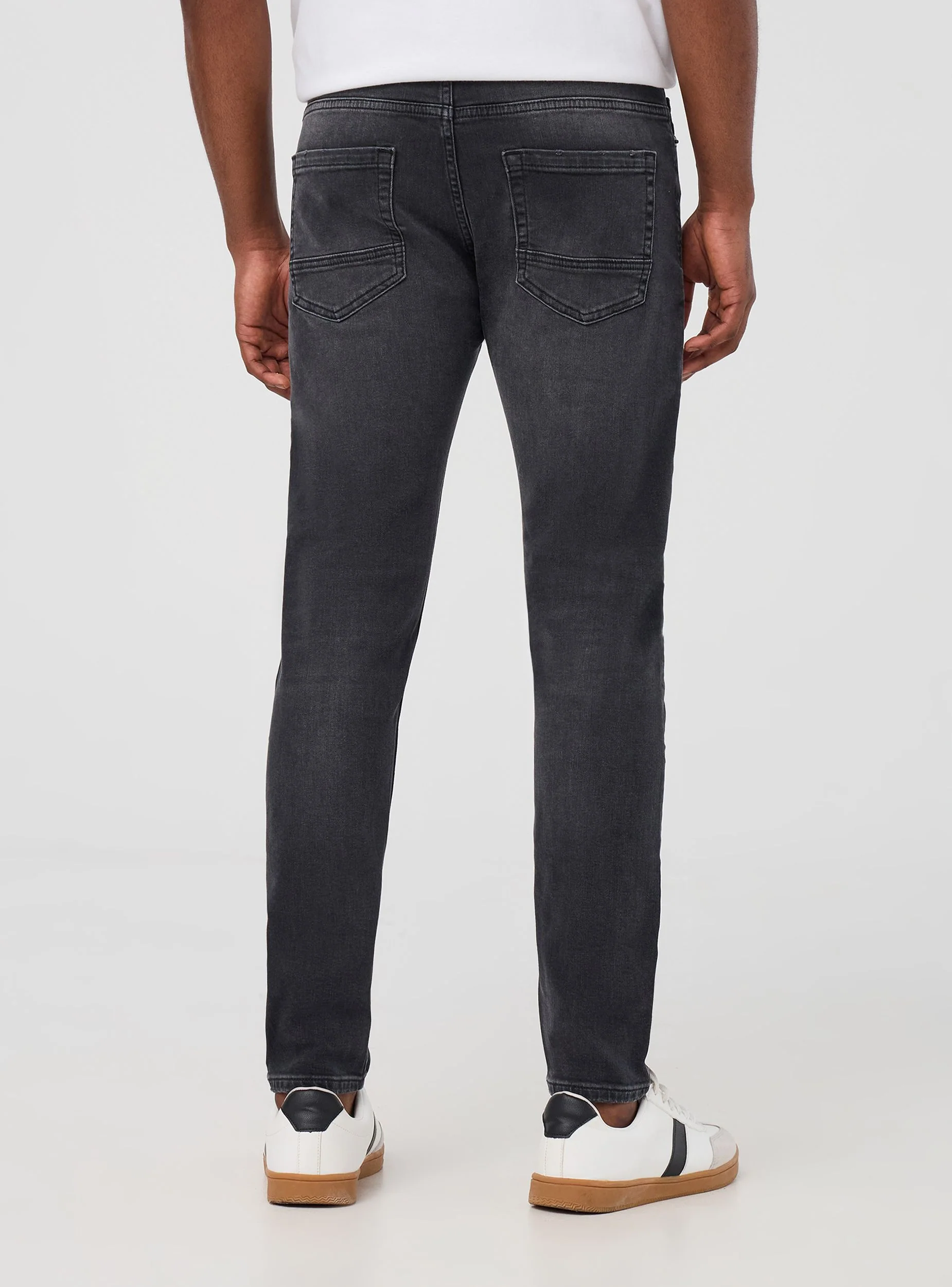 Jeans skinny con strappi piccoli - Image 2