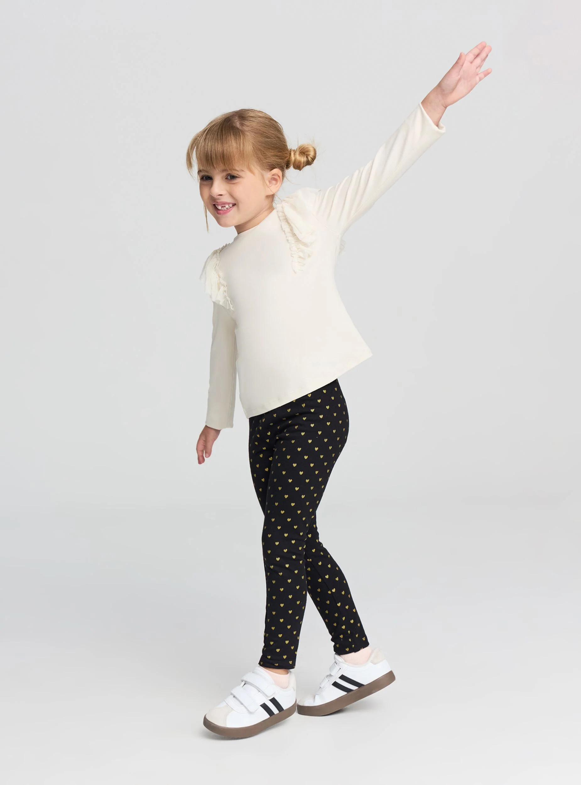 Leggings con cuoricini glitter