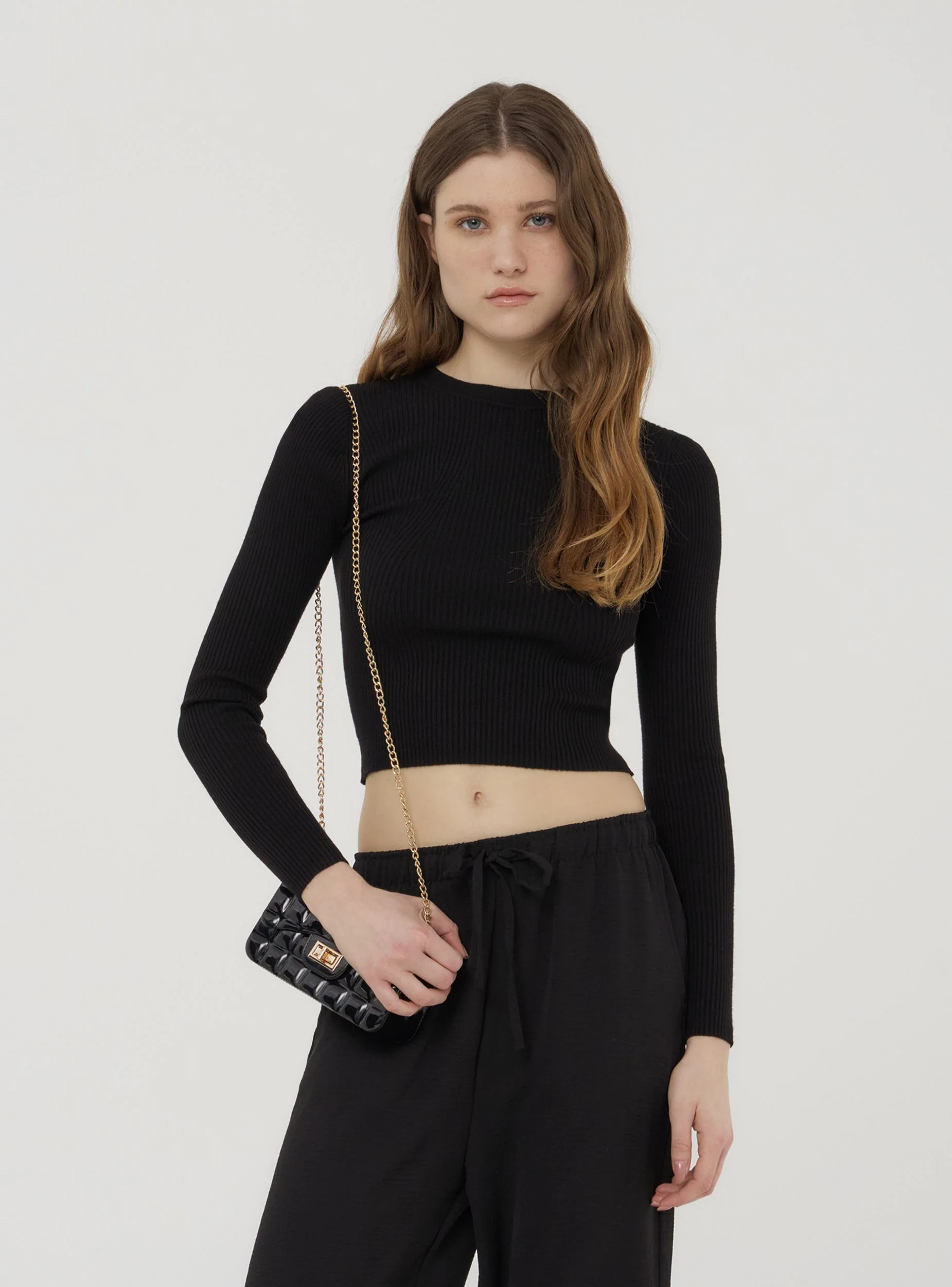 Maglia crop aderente a costine tinta unita