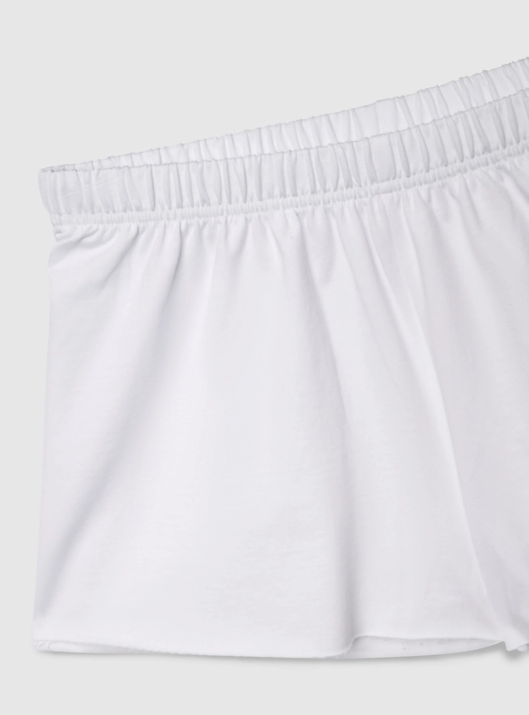 Pantaloncini tuta corti svasati a tinta unita - Image 6