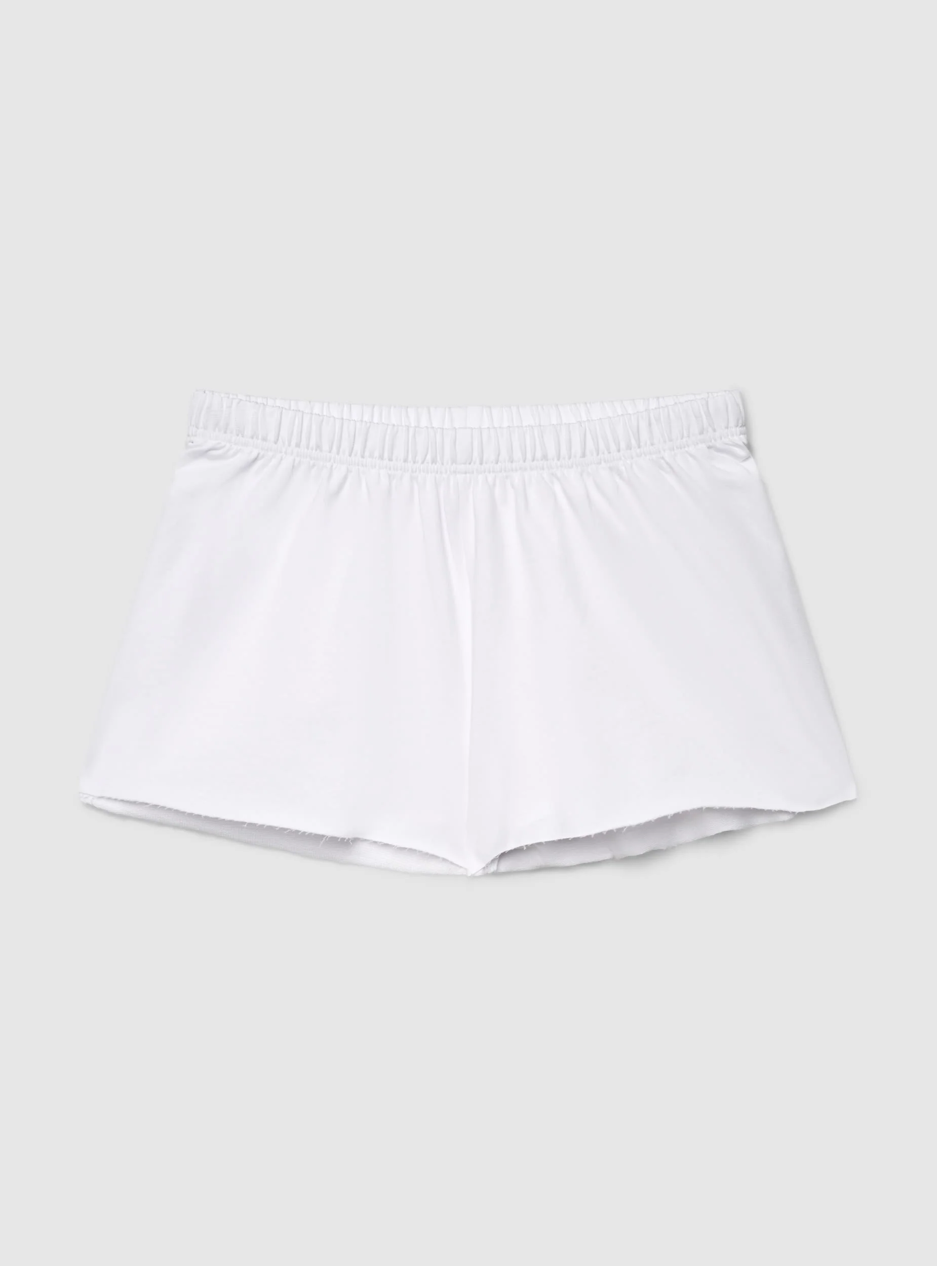 Pantaloncini tuta corti svasati a tinta unita - Image 7