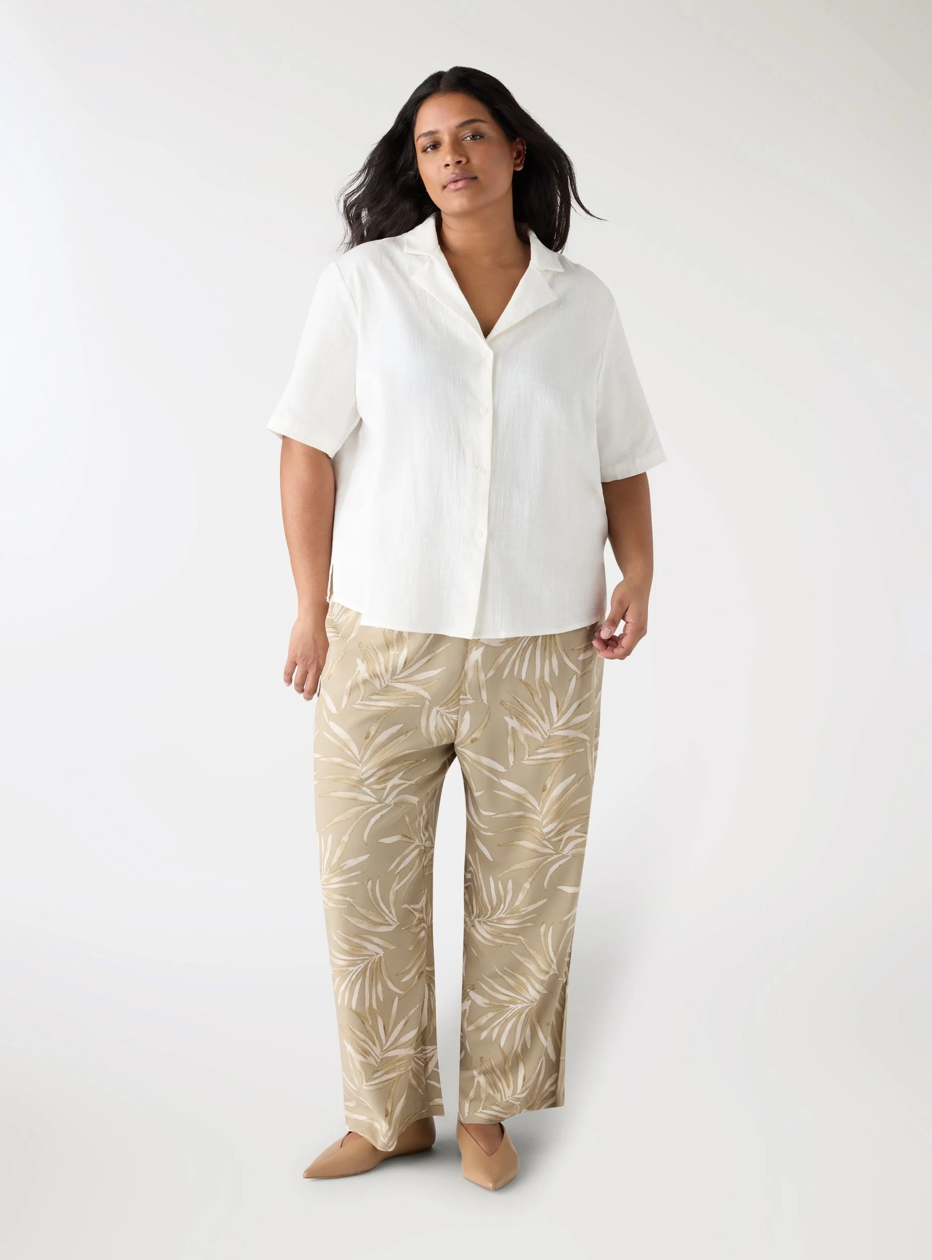 Pantaloni crop a palazzo con stampa foglie