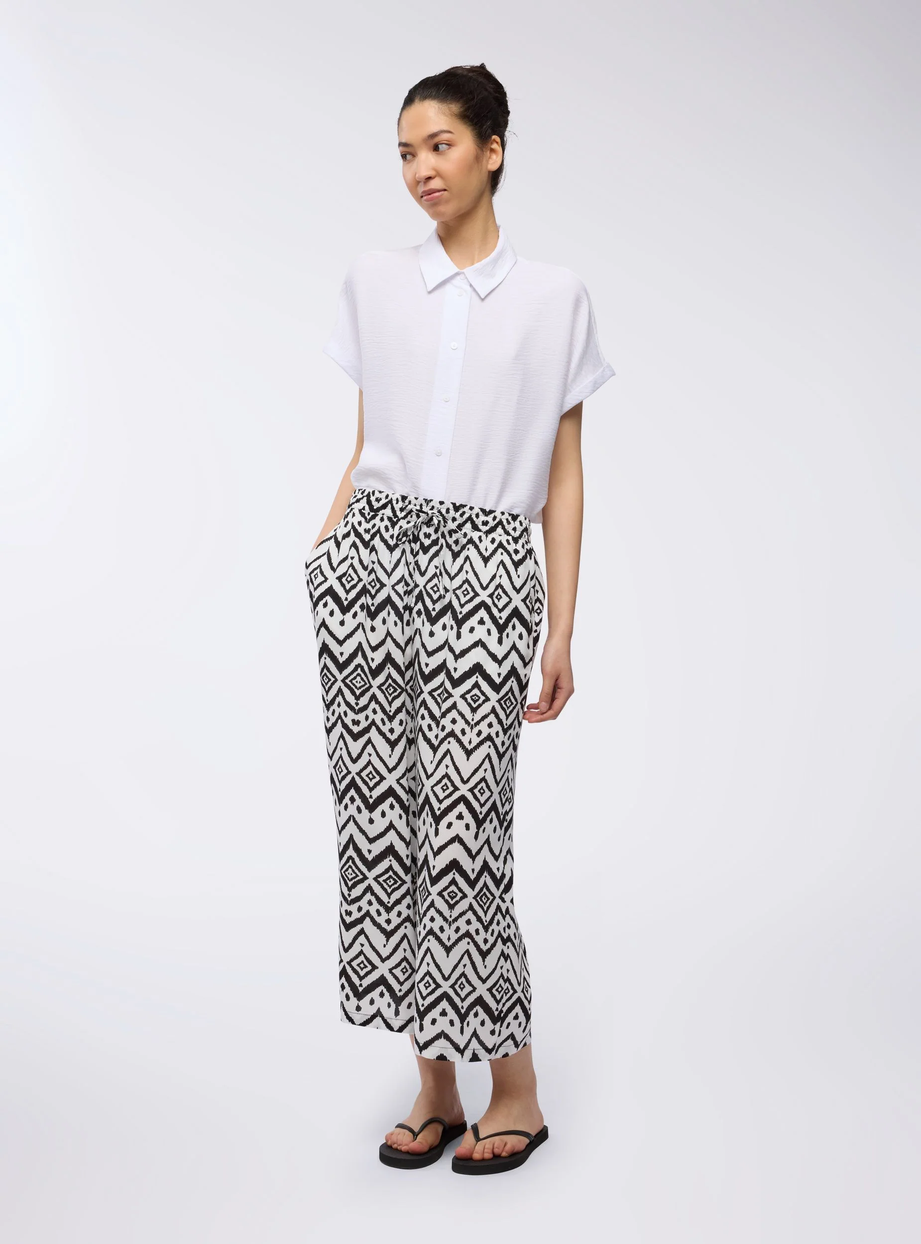 Pantaloni palazzo crop fantasia etnica