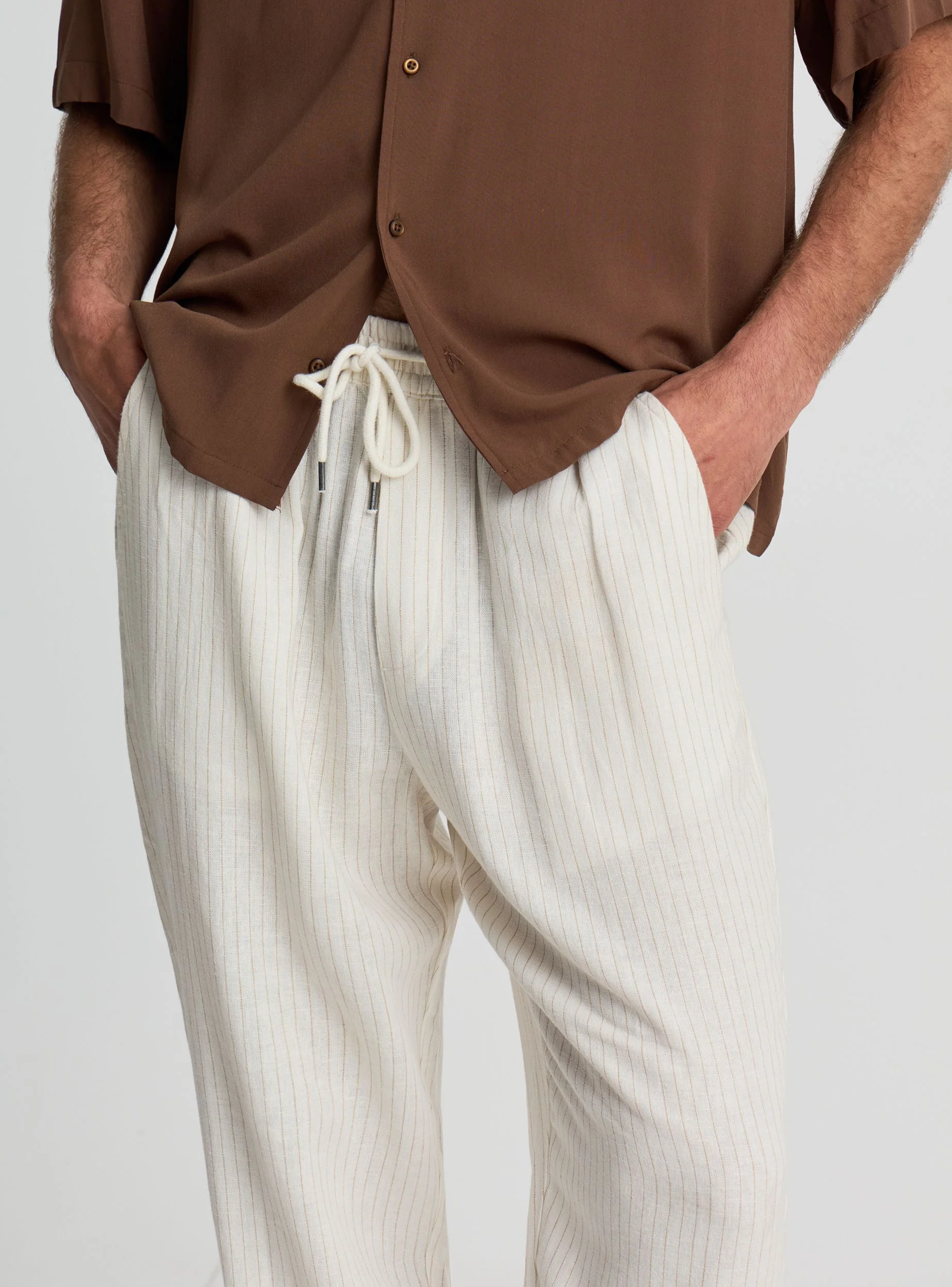 Pantaloni relaxed a righe in lino con coulisse