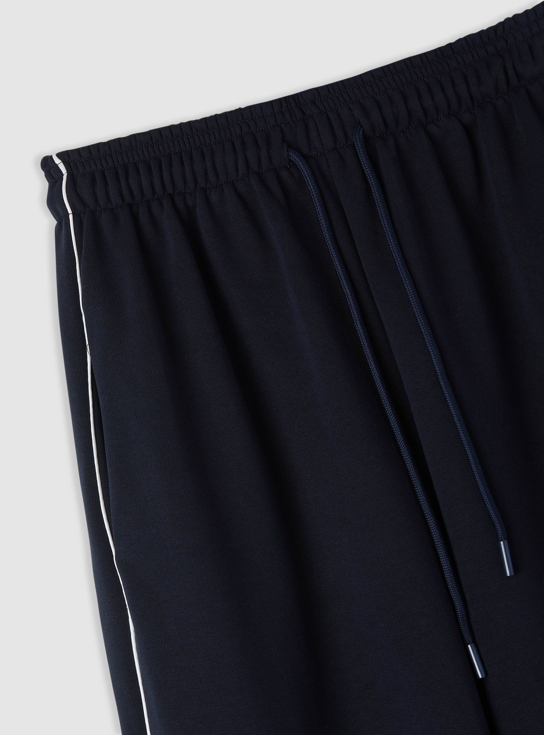 Pantaloni tuta super wide leg a tinta unita con piping - Image 6