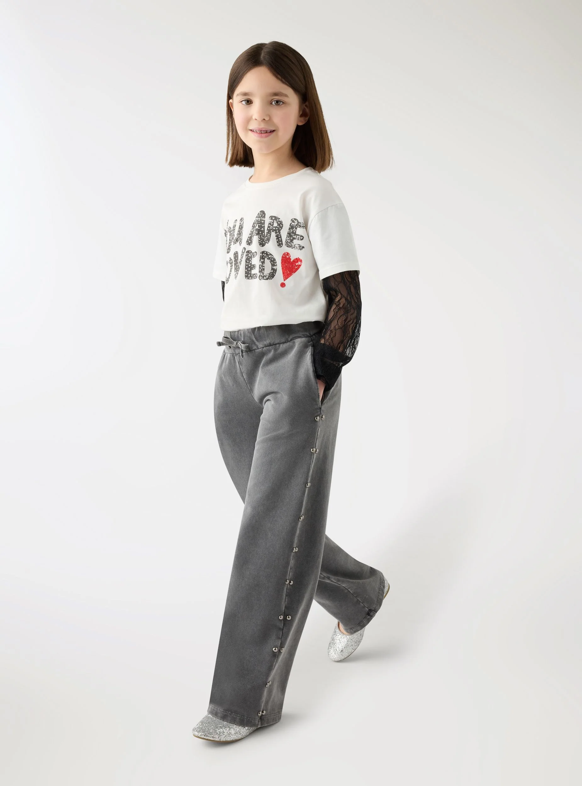 Pantaloni tuta wide leg con borchie