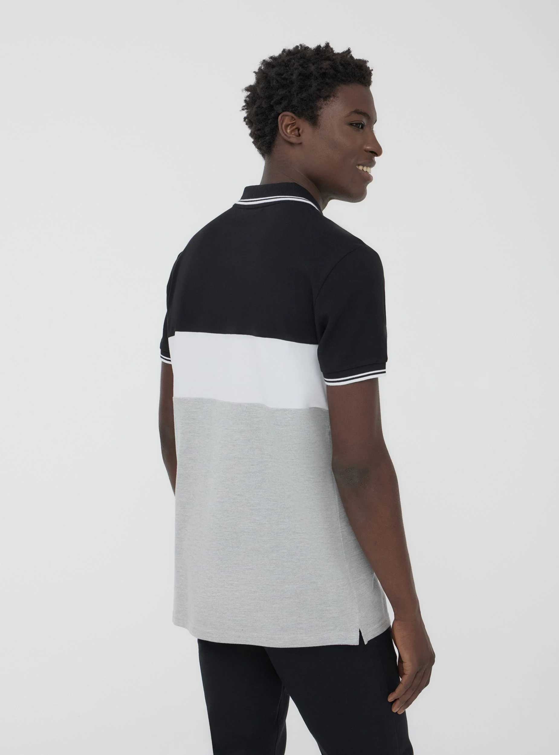 Polo in piquet block color - Image 2