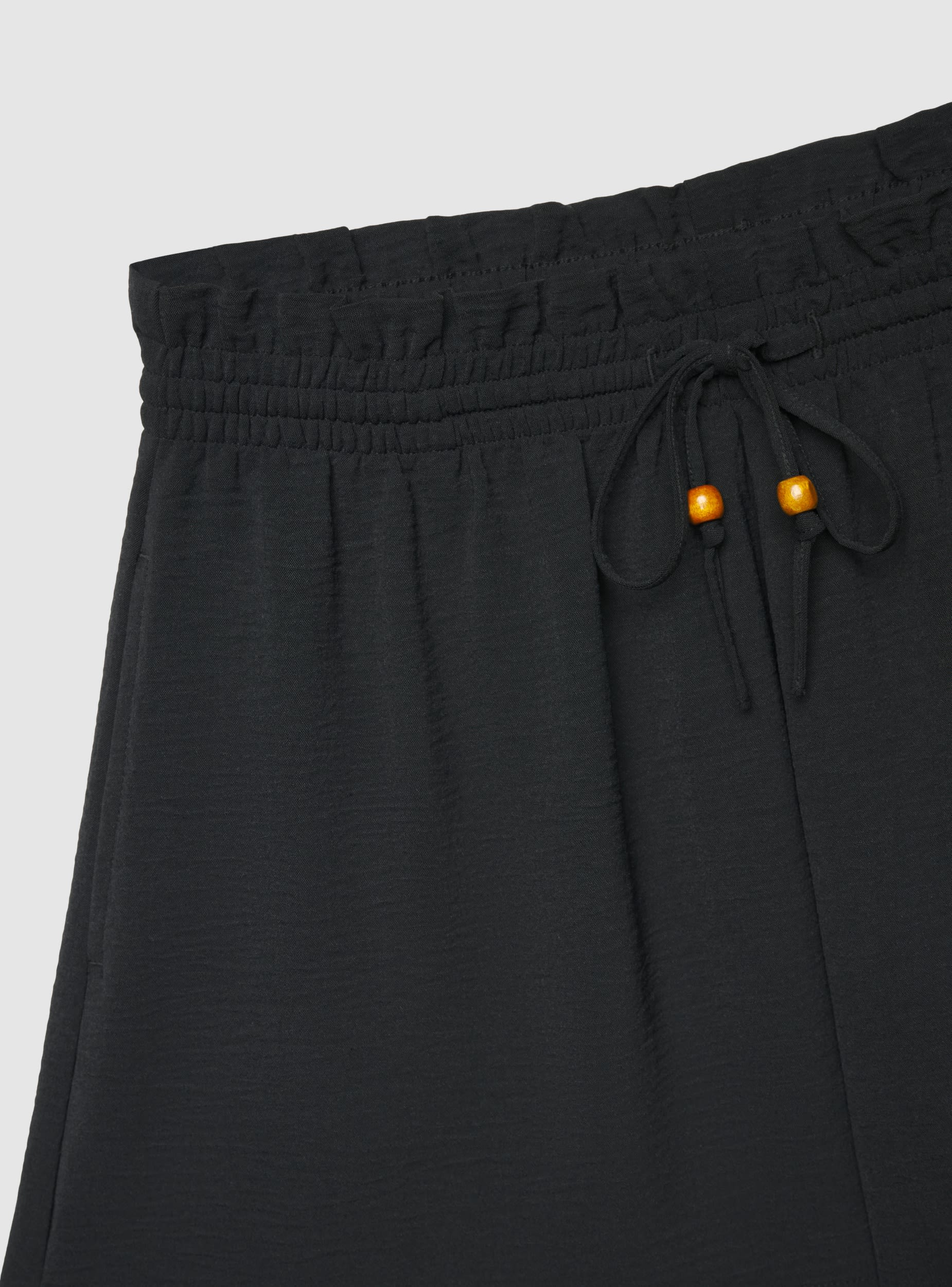Shorts morbidi a tinta unita con coulisse - Image 5