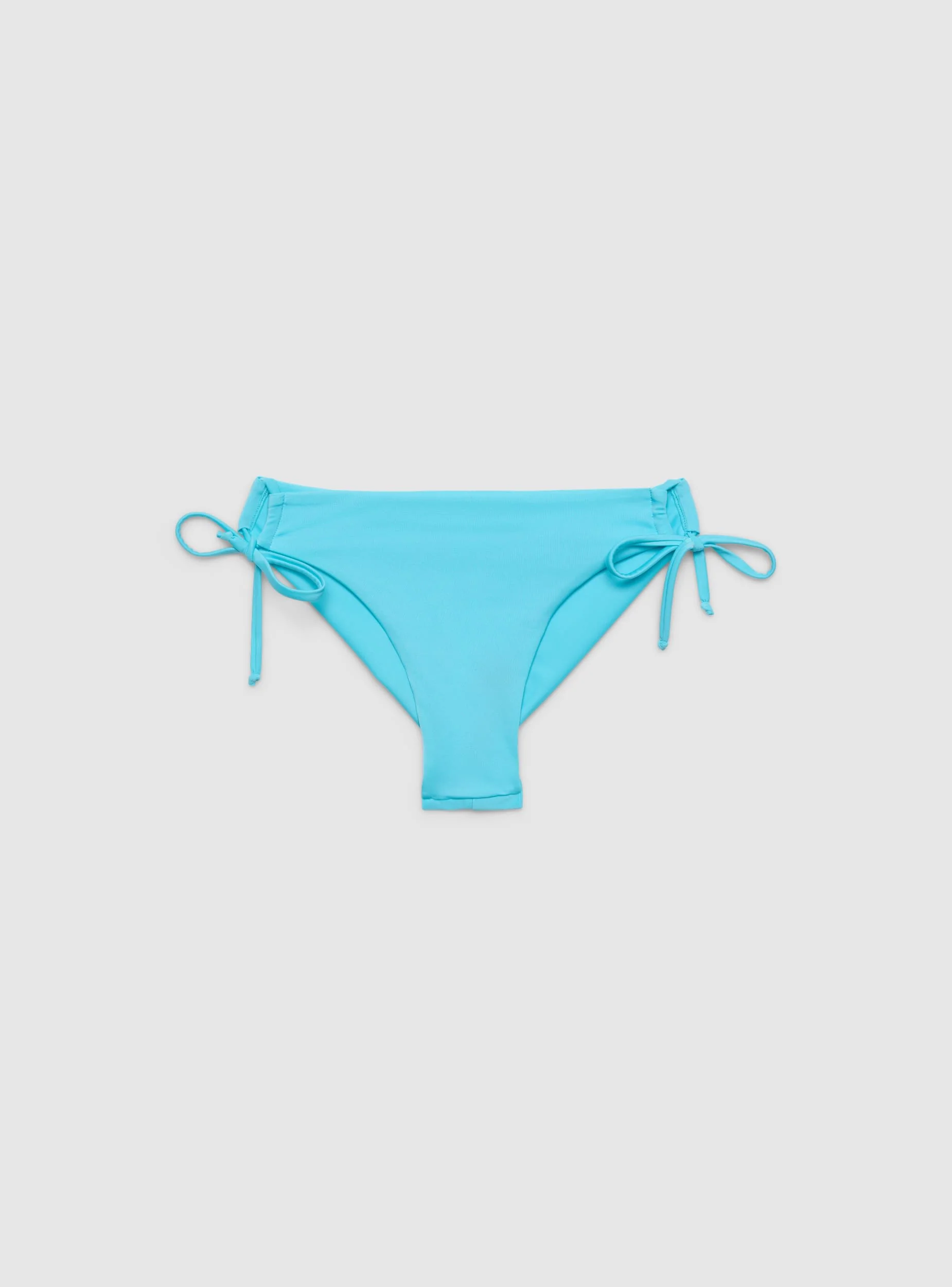 Slip bikini brasiliana con coulisse laterali tinta unita - Image 5
