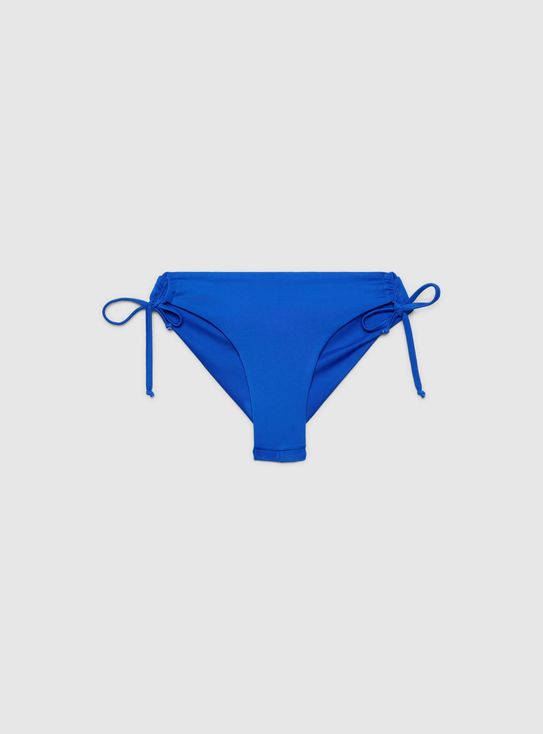 Slip bikini brasiliana con coulisse laterali tinta unita - Image 5