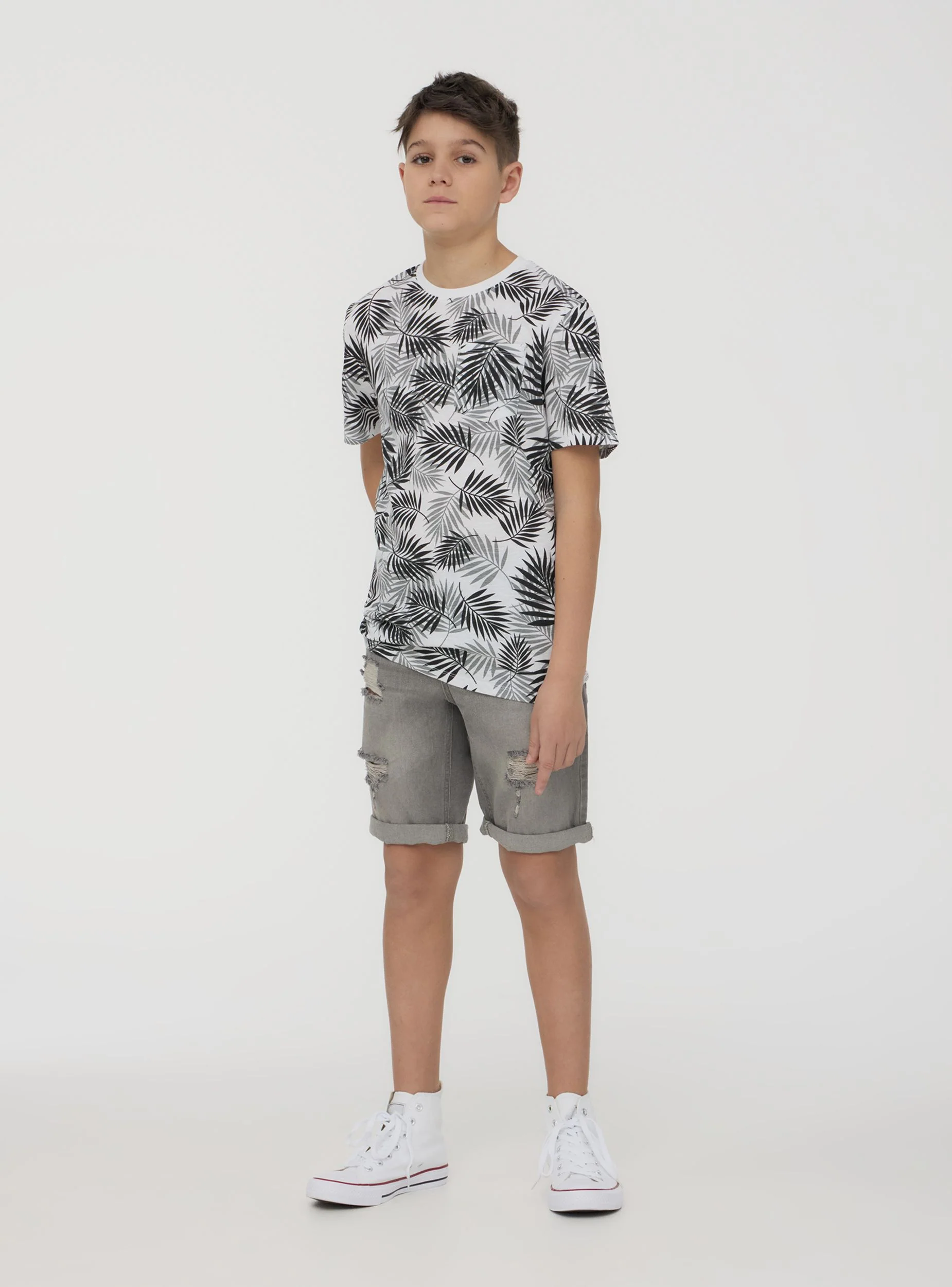 T-shirt con taschino fantasia foglie