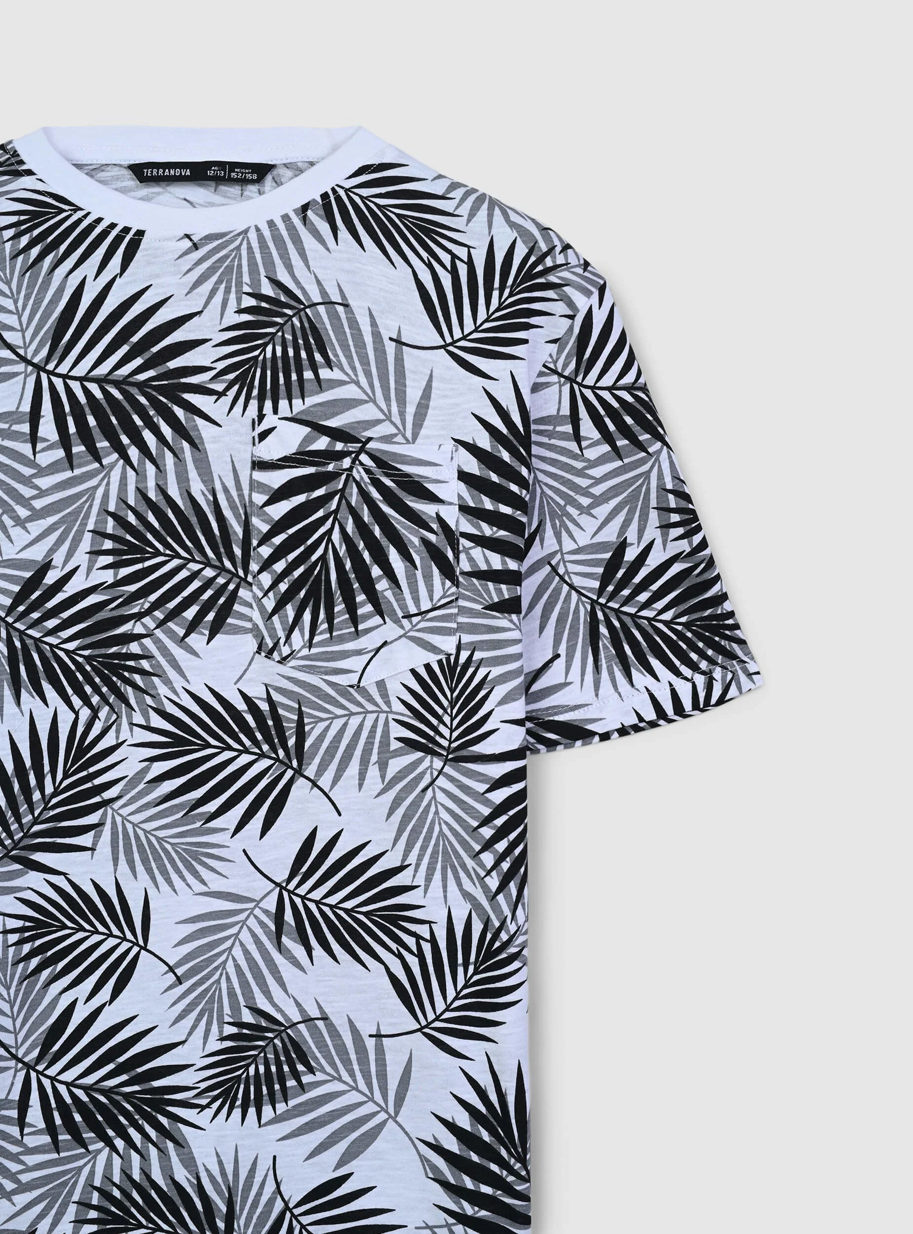 T-shirt con taschino fantasia foglie - Image 5