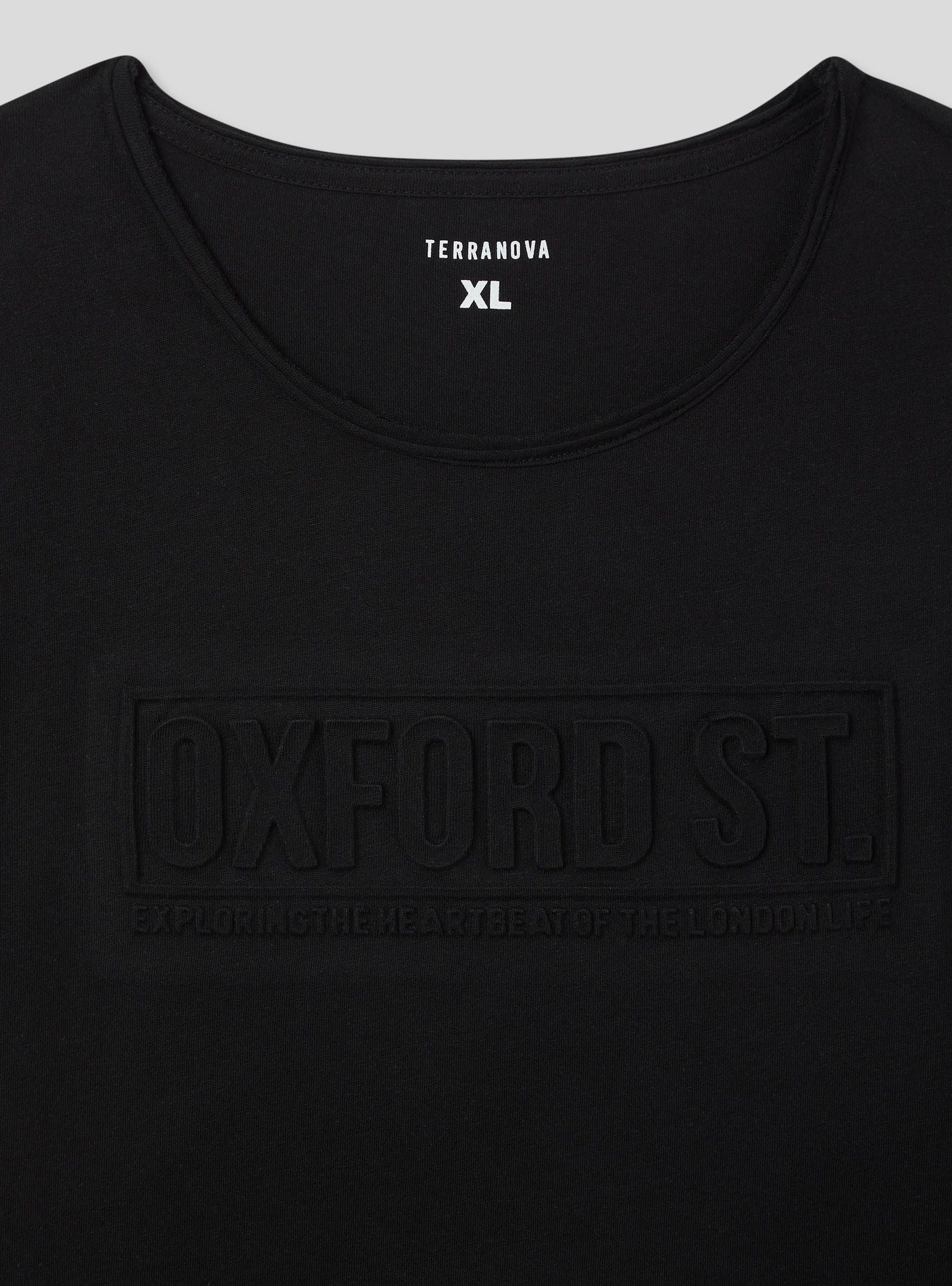 T-shirt taglio vivo con scritta 3D