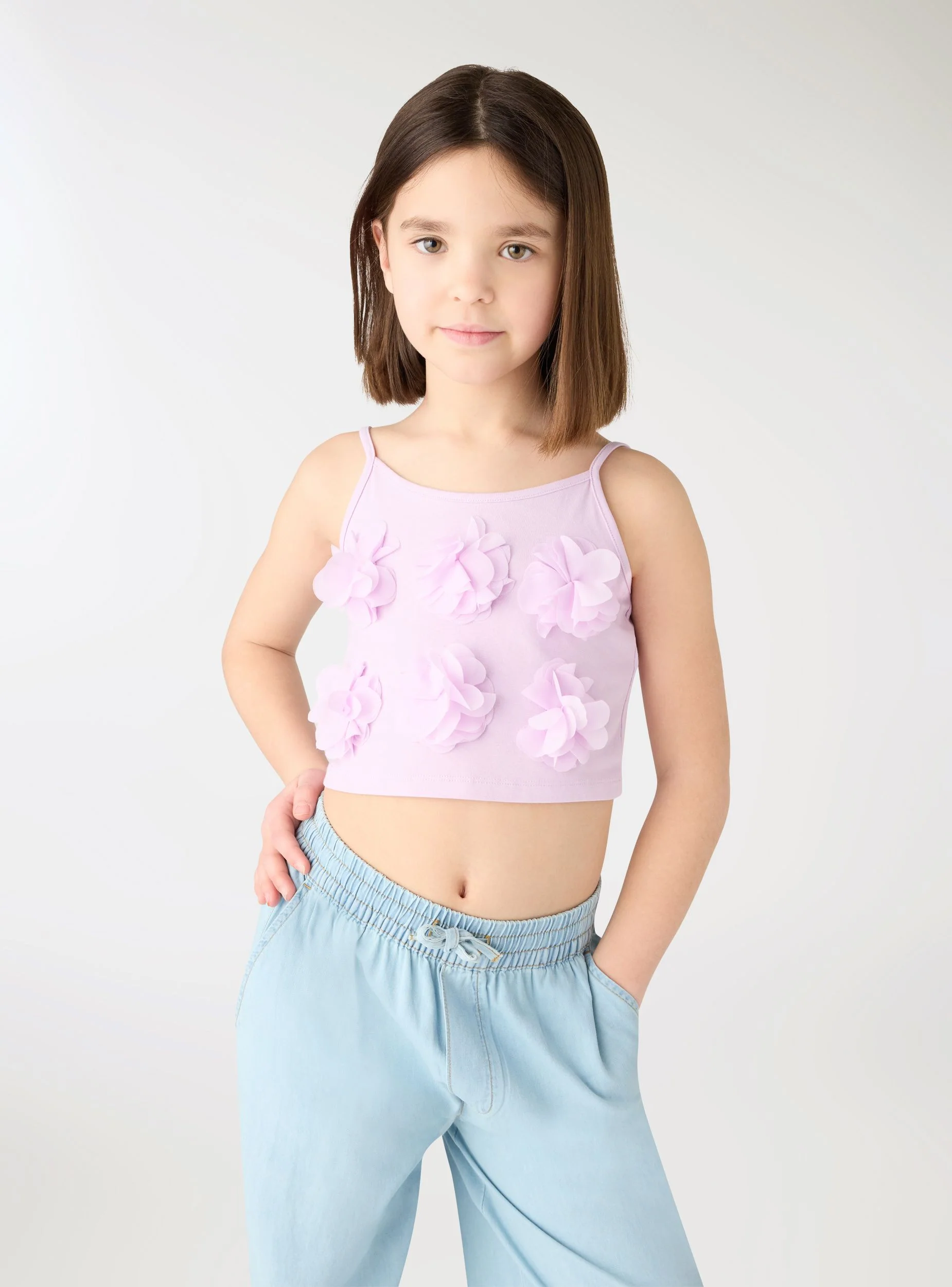 Top con applicazioni floreali tulle