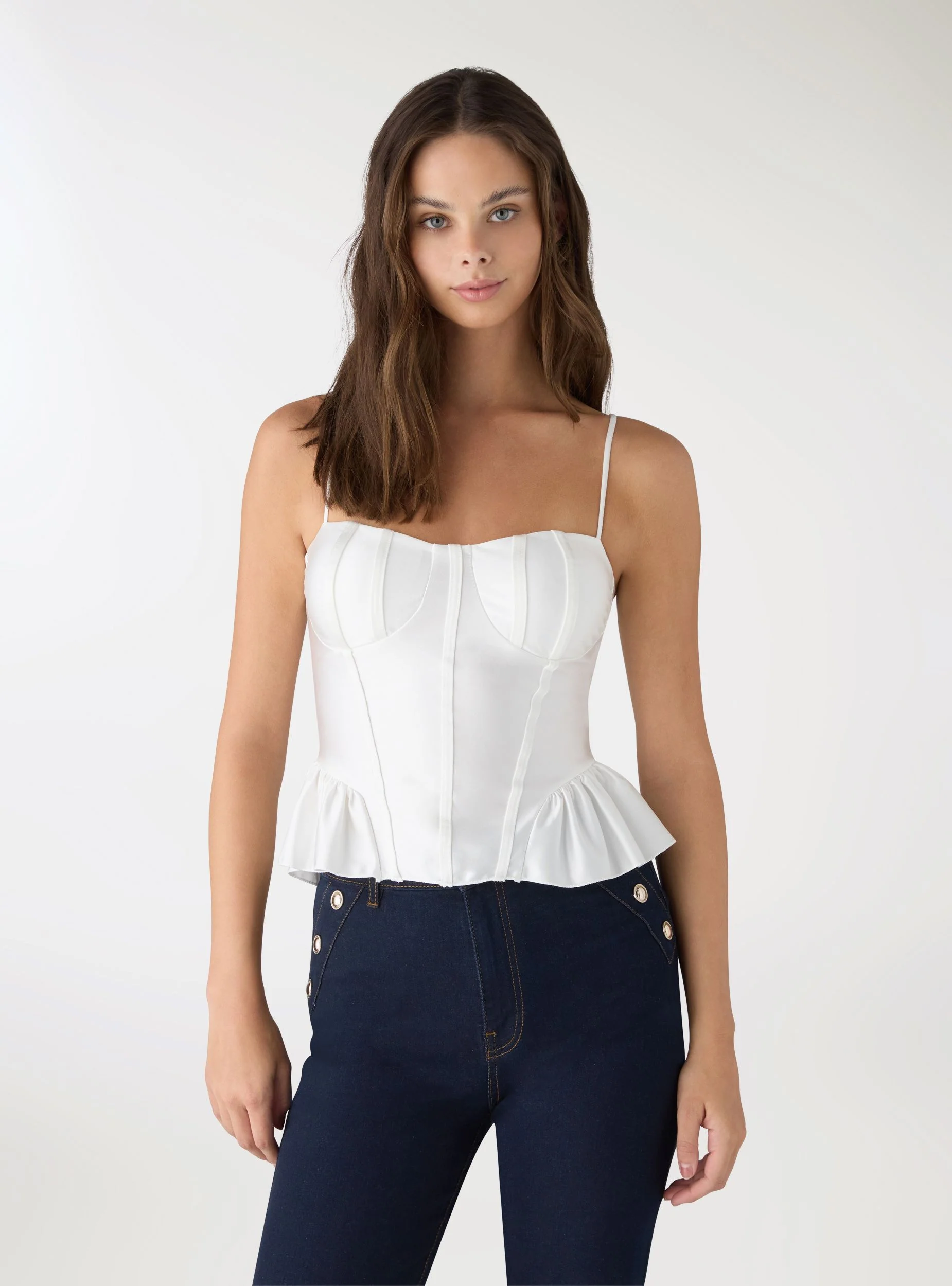 Top corsetto con coppe e peplum