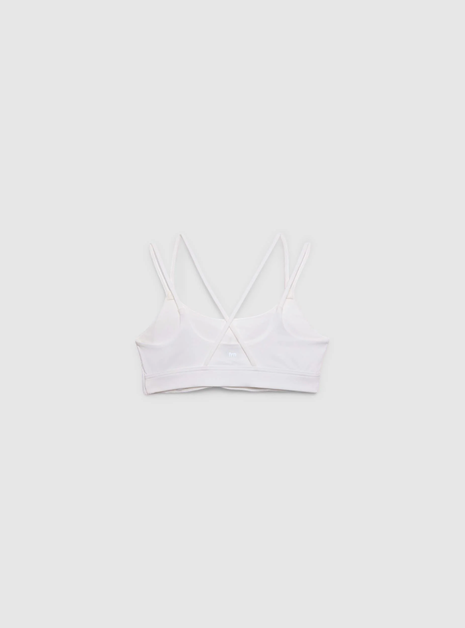 Top sportivo con spalline incrociate - Image 4