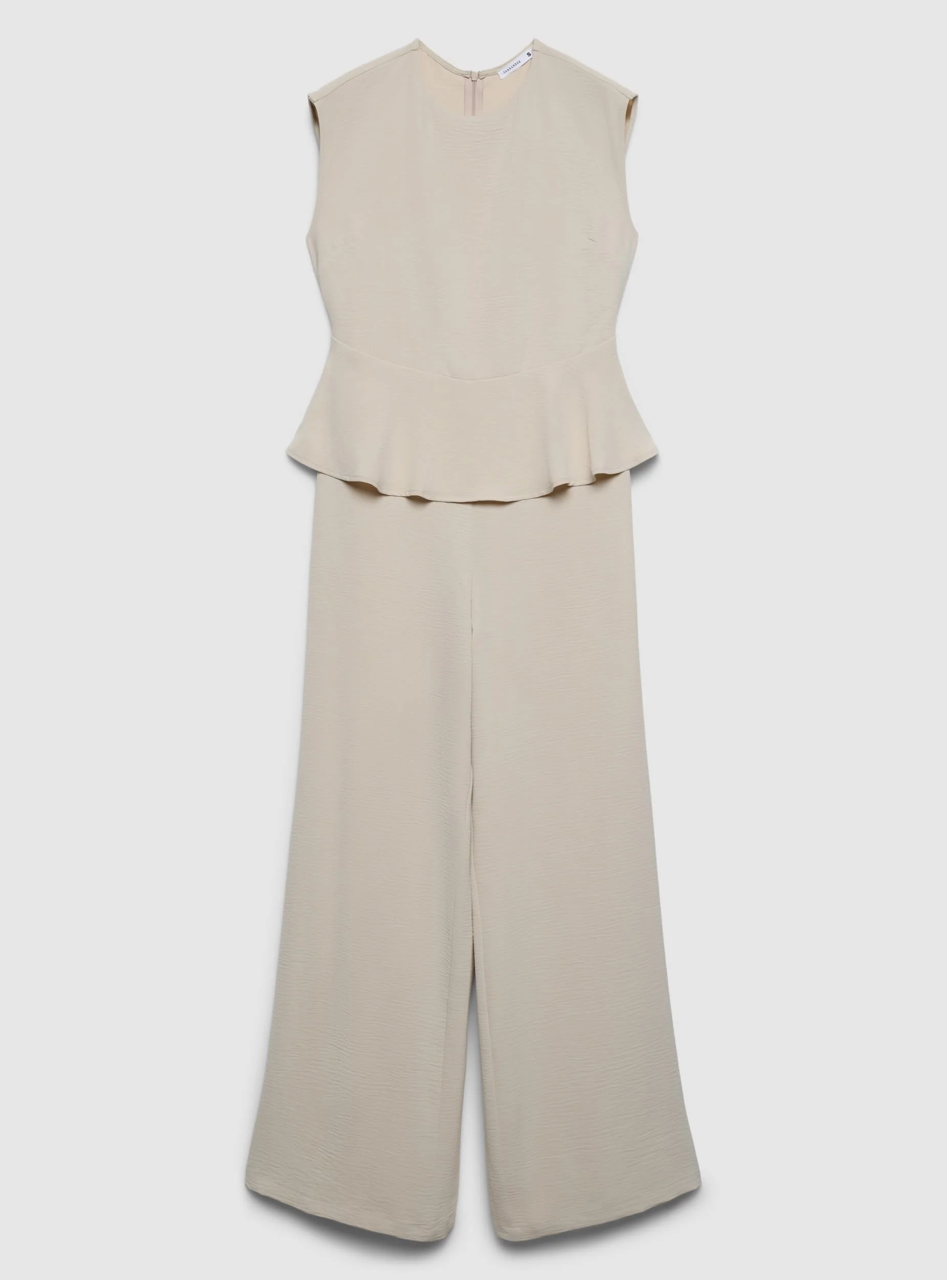 Tuta smanicata con peplum - Image 5