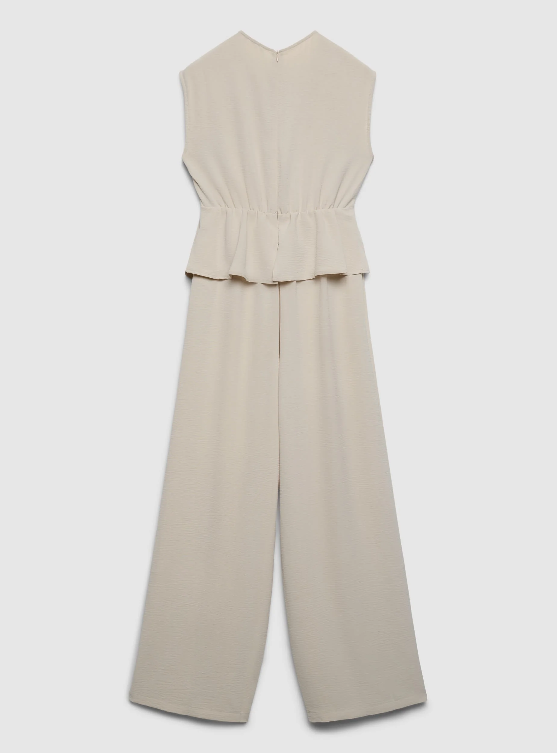 Tuta smanicata con peplum - Image 6