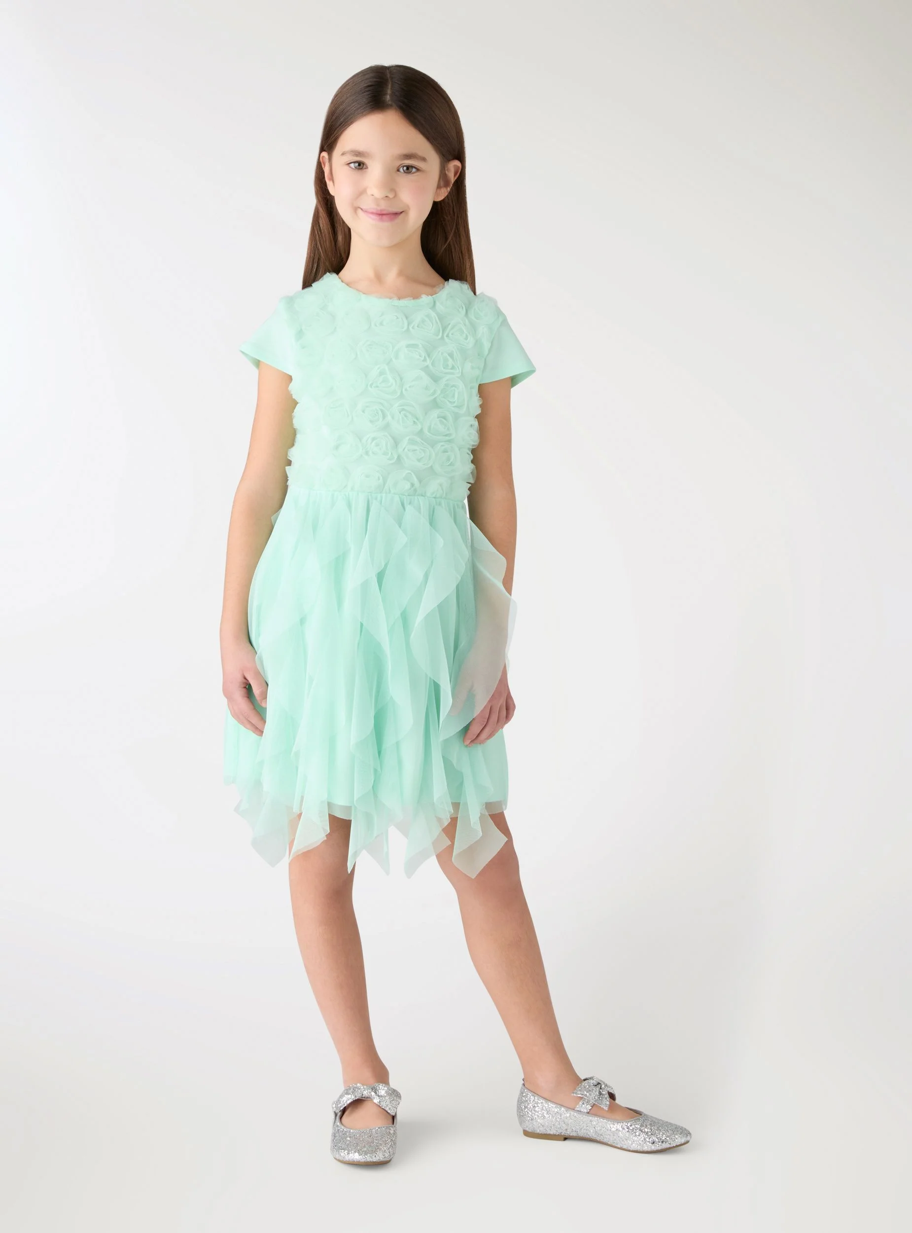 Vestito con applicazioni floreali e balze